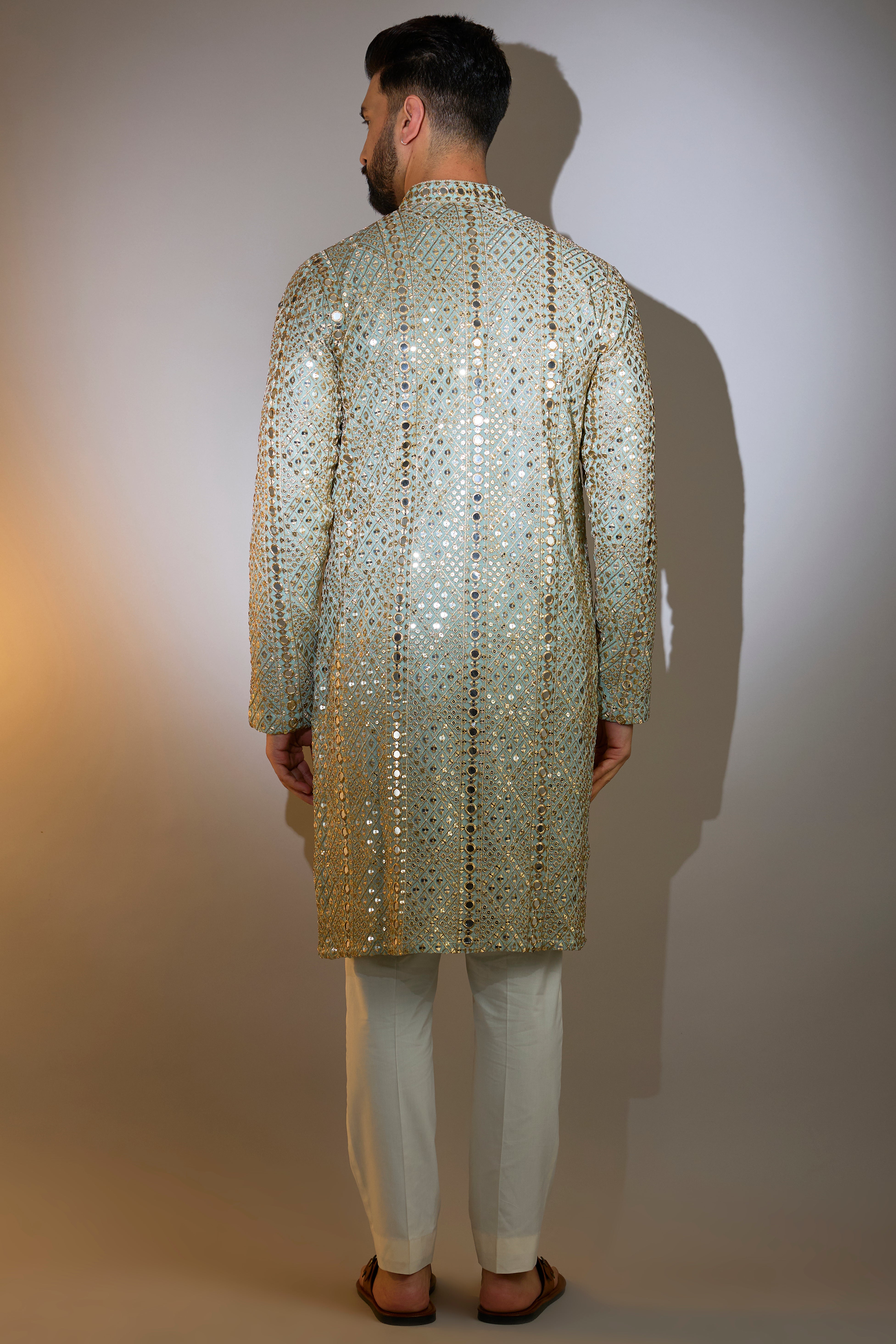 blue mirror work kurta with heazy zari detailing