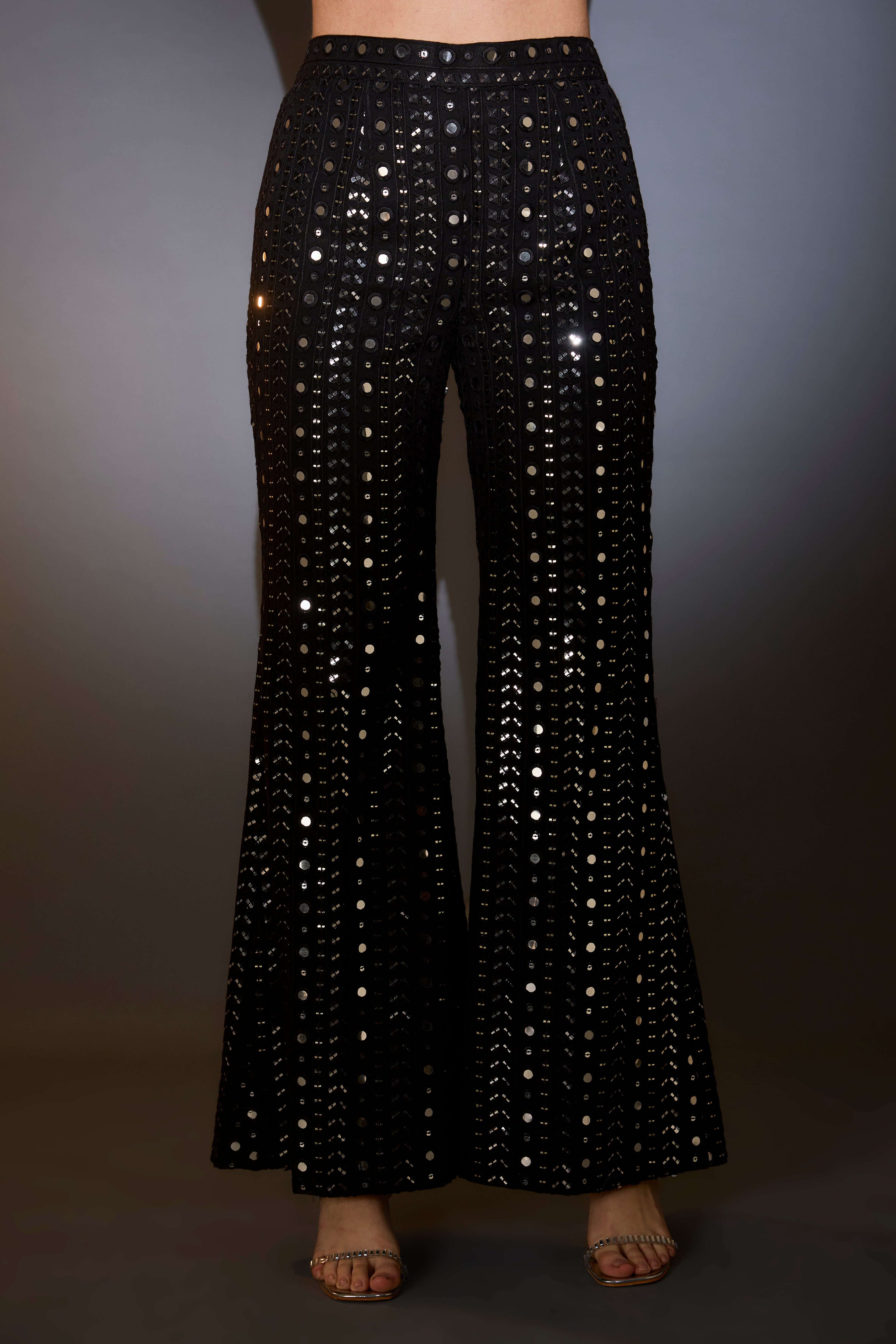 Black mirror-work indo-western co-ord set with mirror-work boot-cut trousers.