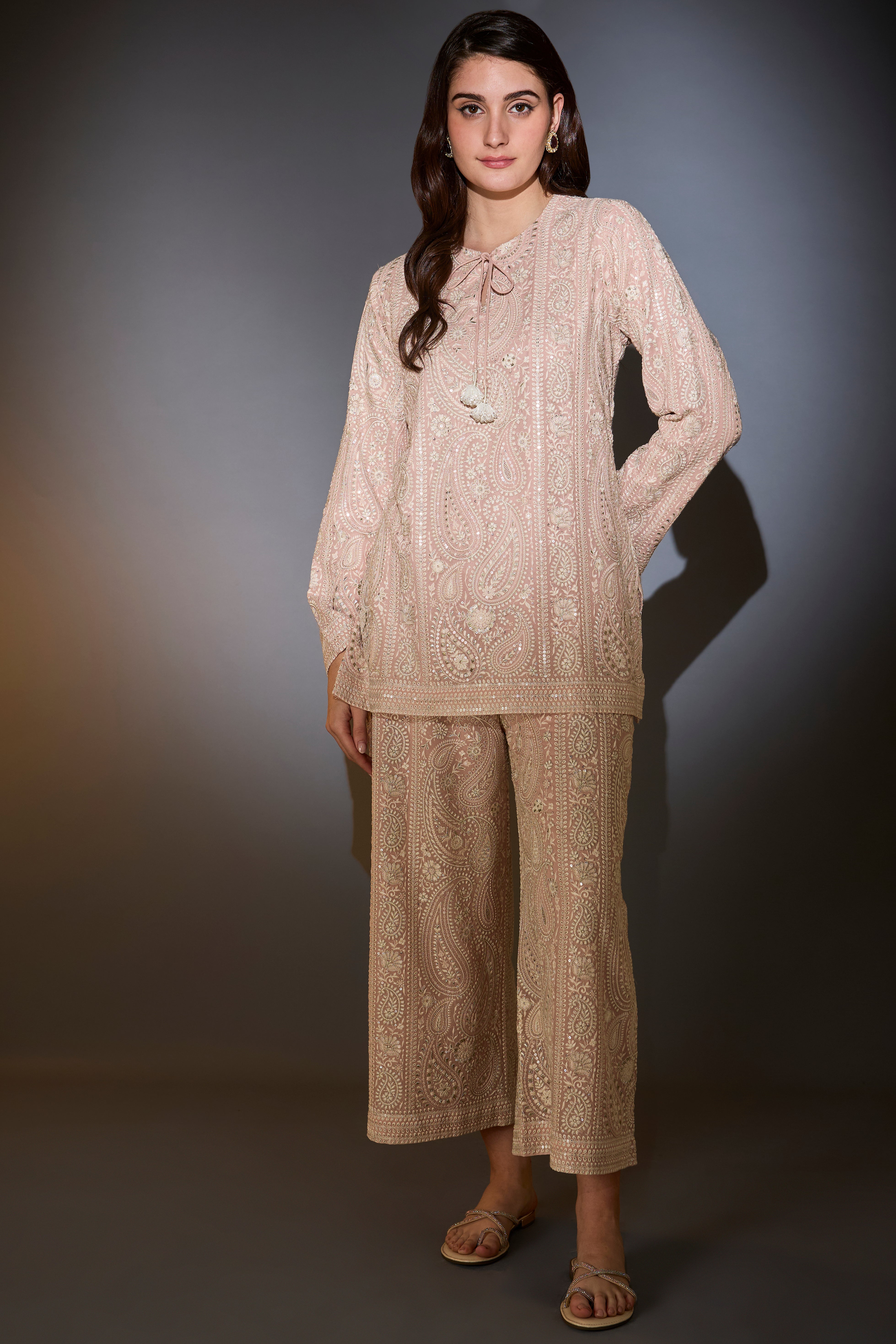 Dust pink chikankari co-ord set with paisley emboidery.