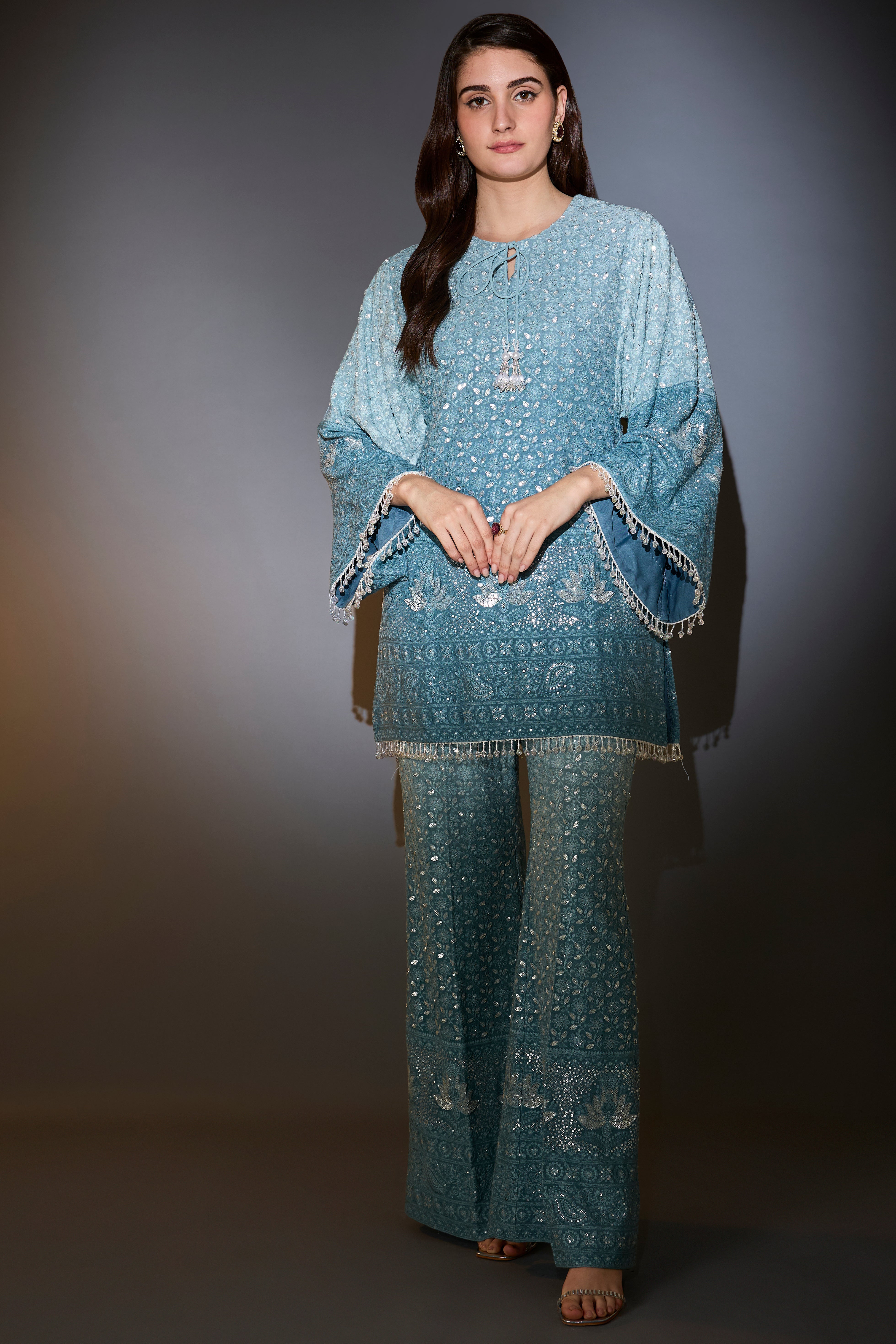 Blue ombre chikankari co-ord set with detailed thread and sequin embroidery.