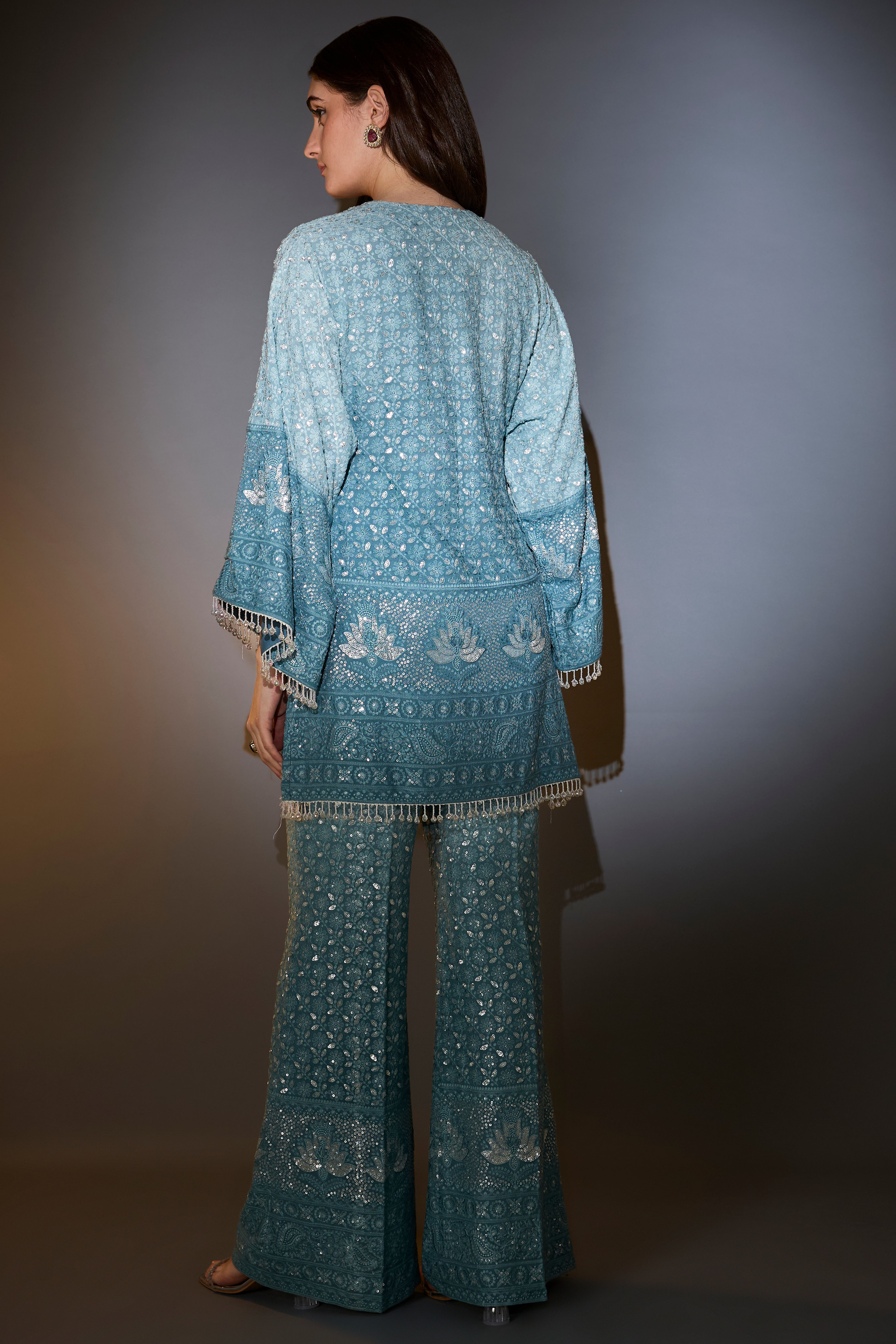 Blue ombre chikankari co-ord set with detailed thread and sequin embroidery.