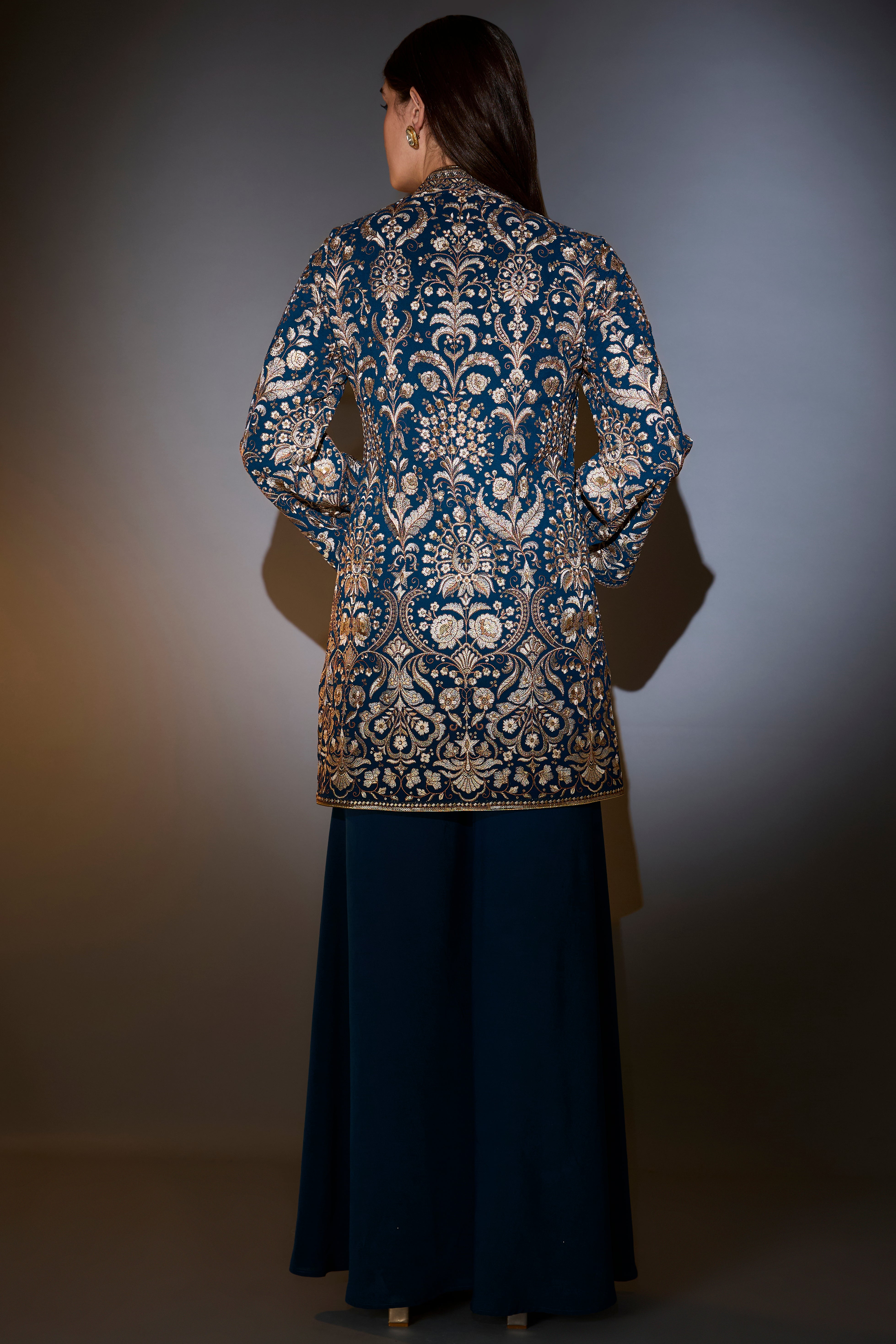 Royal blue angrakha sharara set with intricate thread and zari embroidery.