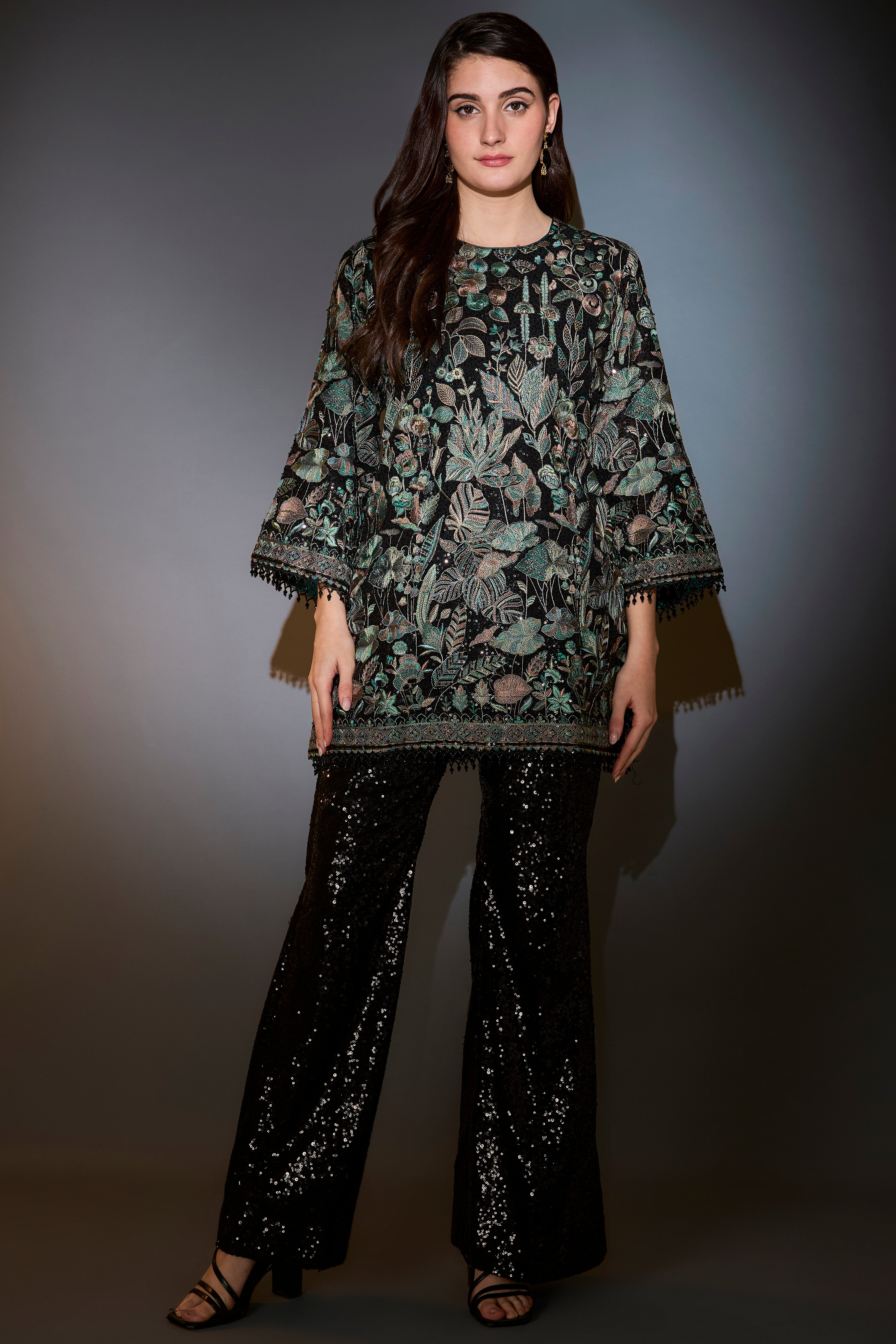 B+F23:F24lack and green co-ord set with heavy floral and sequins embroider paired with sequined pants.