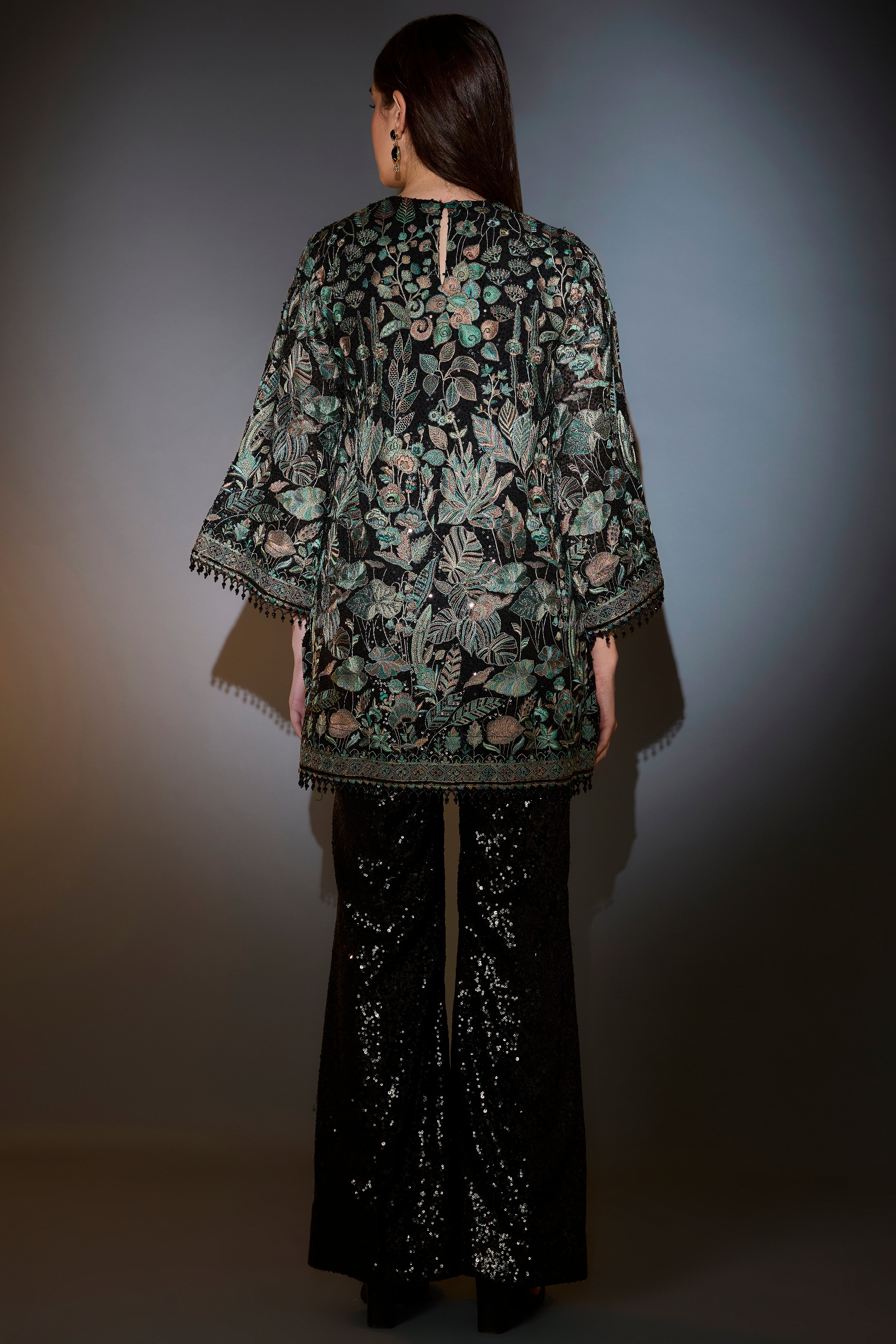 B+F23:F24lack and green co-ord set with heavy floral and sequins embroider paired with sequined pants.