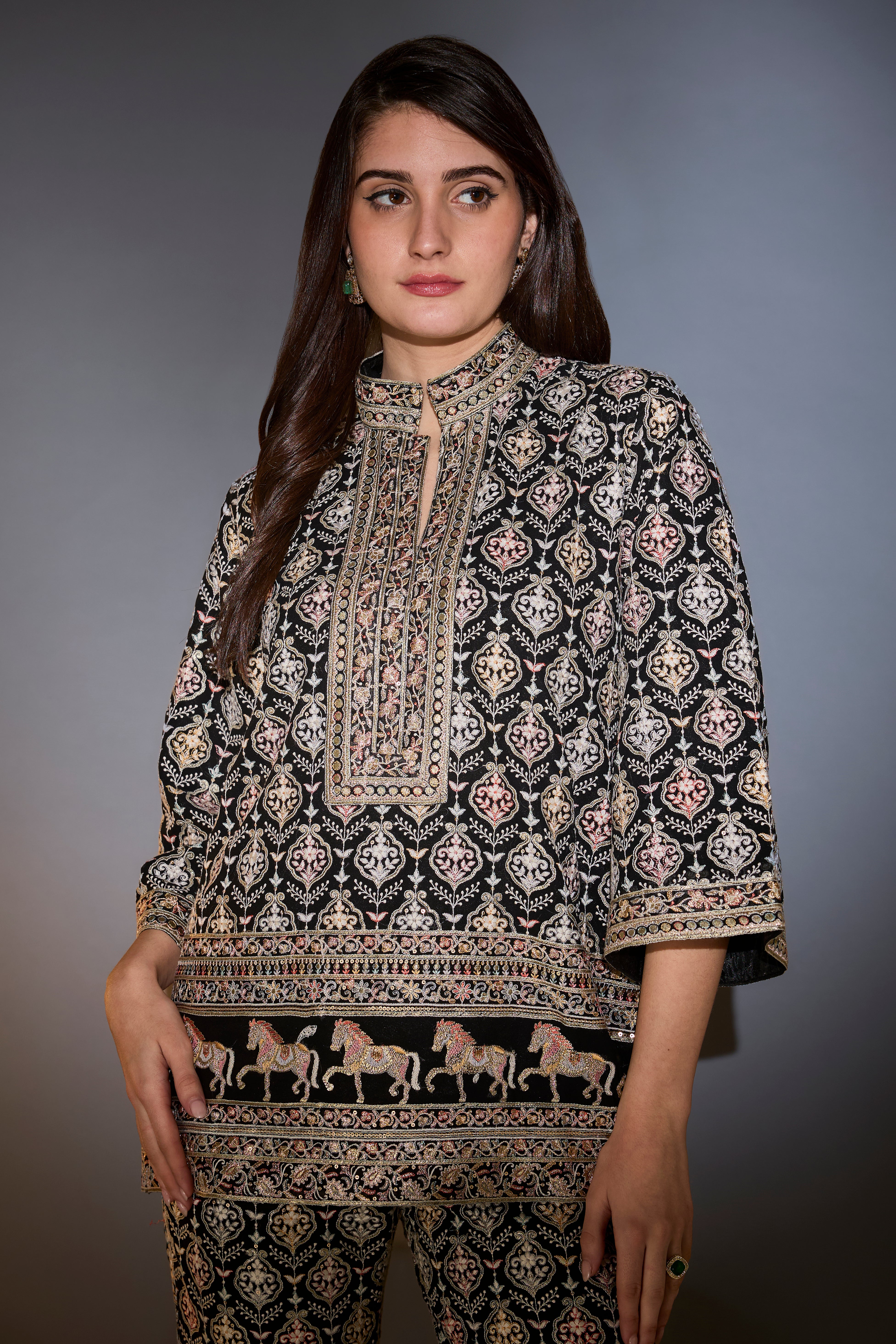 Black multi-thread work co-ord set with horse motifs.