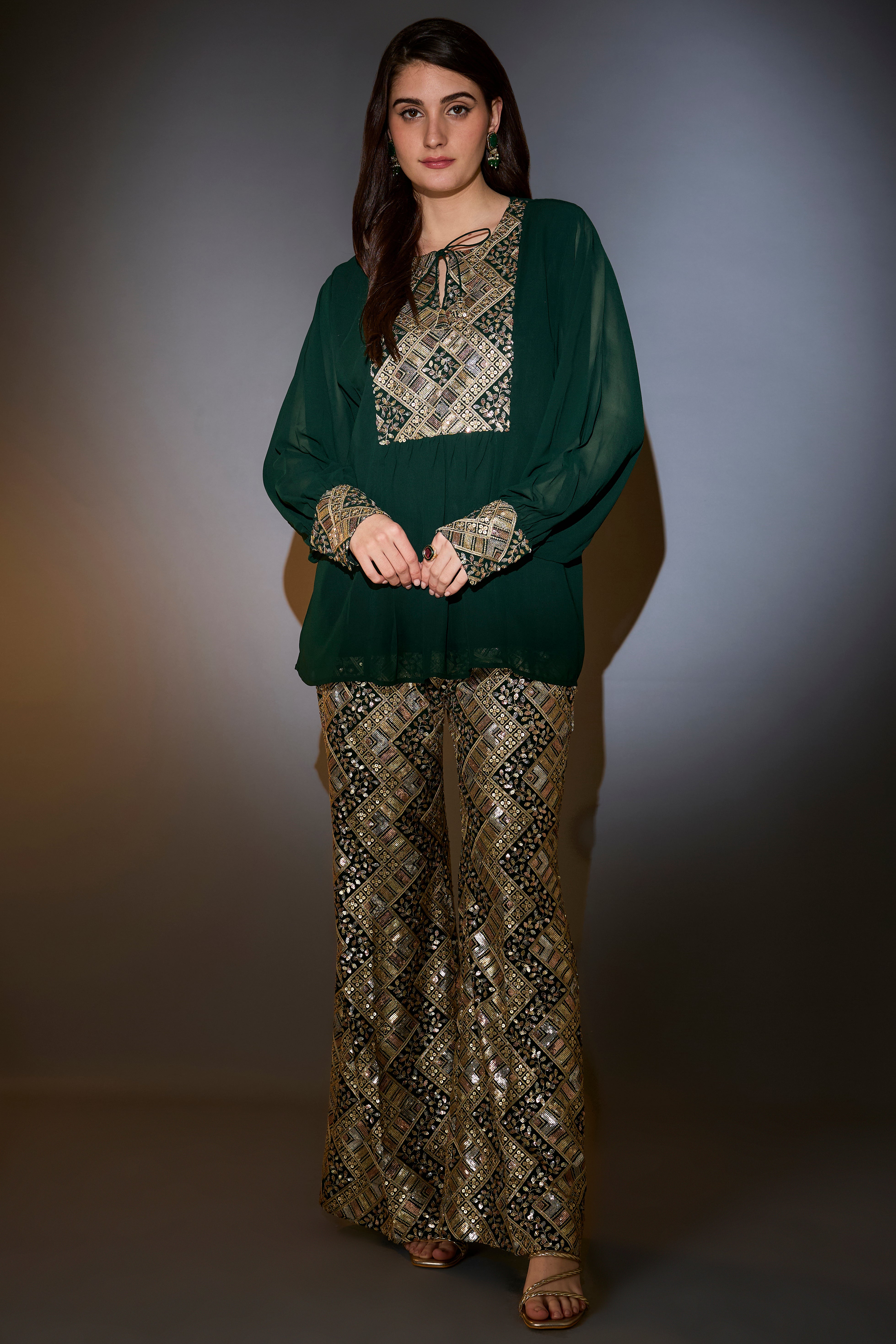 Green co-ord set intertwining gold and multi-colour sequin embroidery.