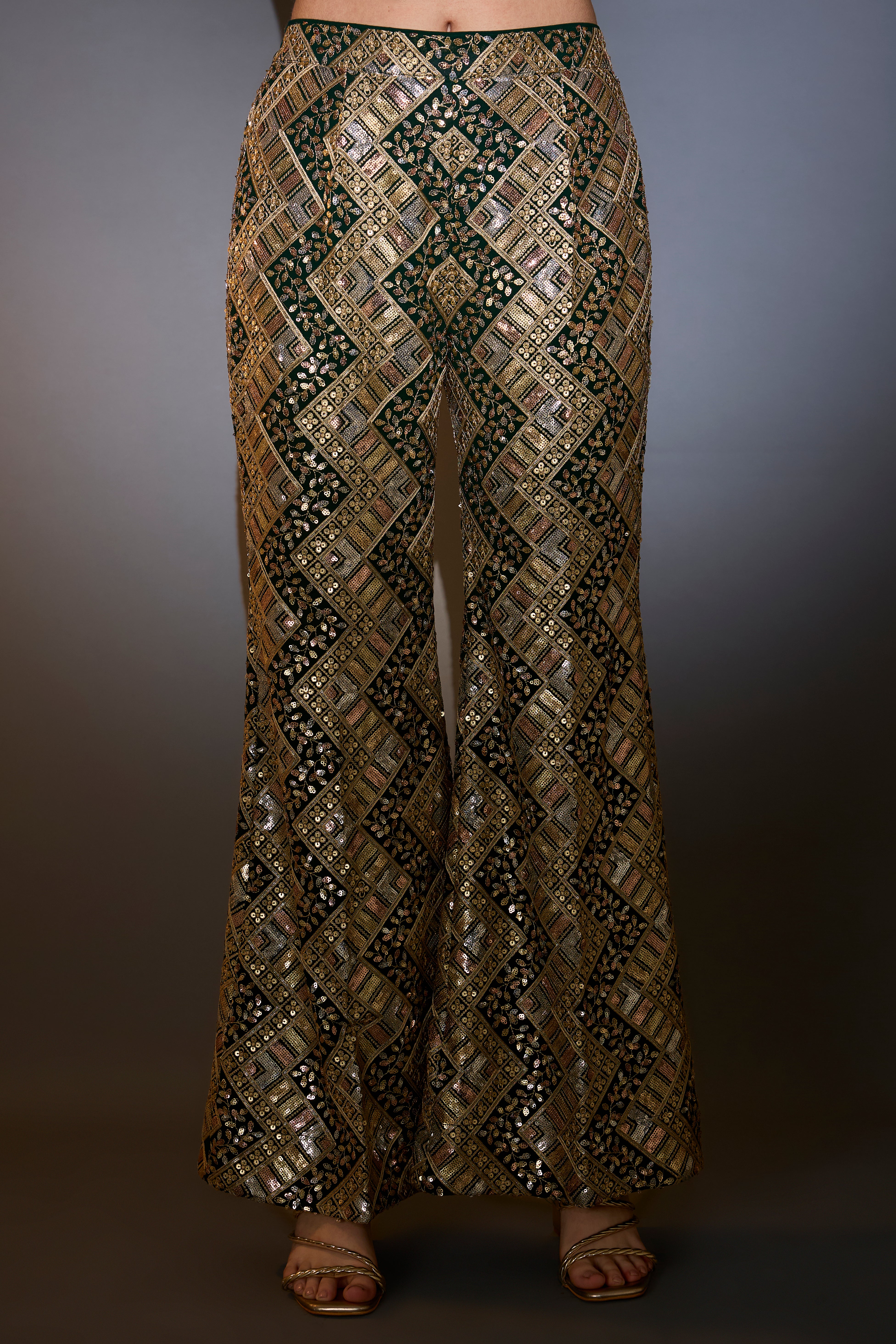 Green co-ord set intertwining gold and multi-colour sequin embroidery.