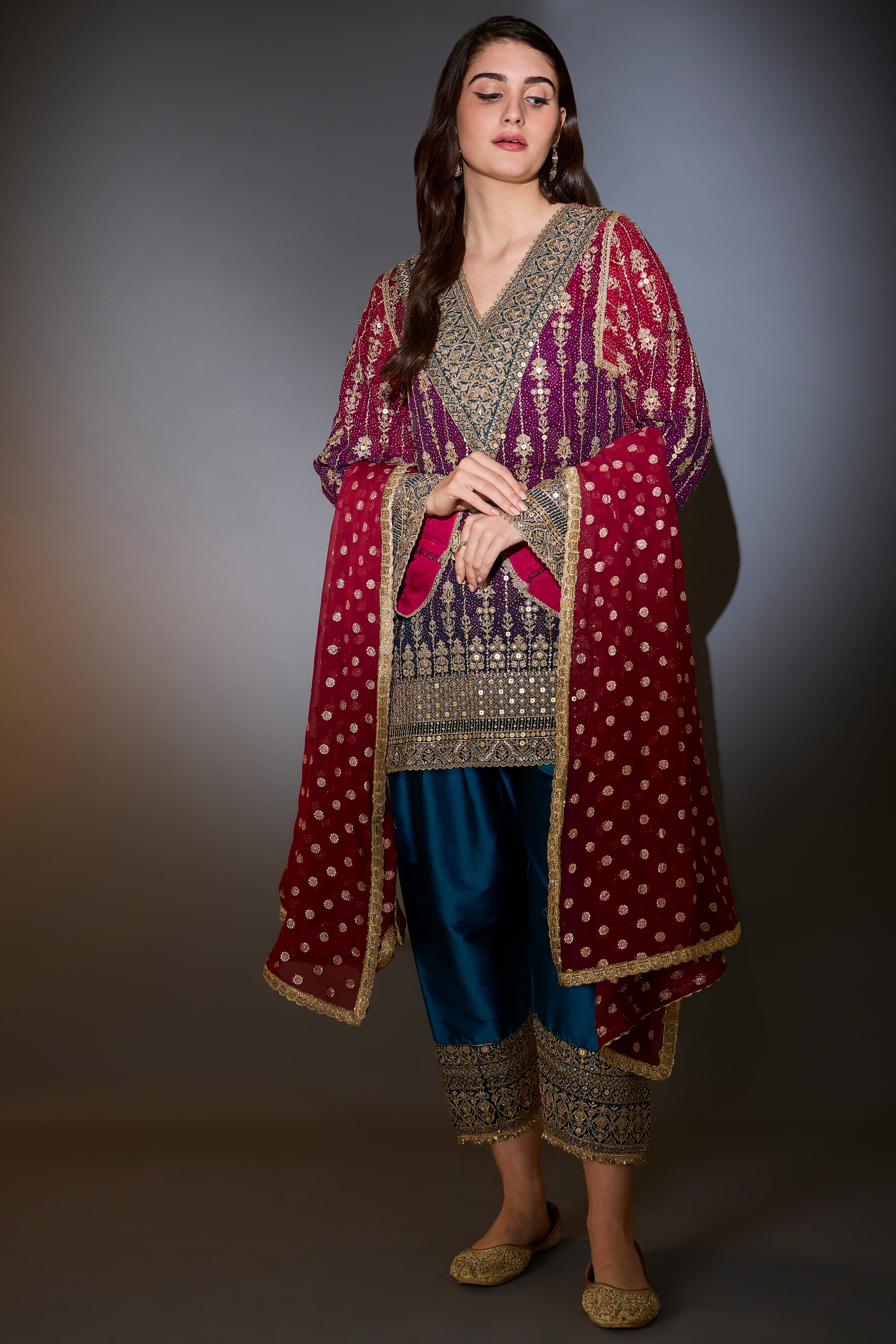 Suit set with short ombre kurta with intricate aari work, paired with banarsi dupatta with borders and silk salwar.