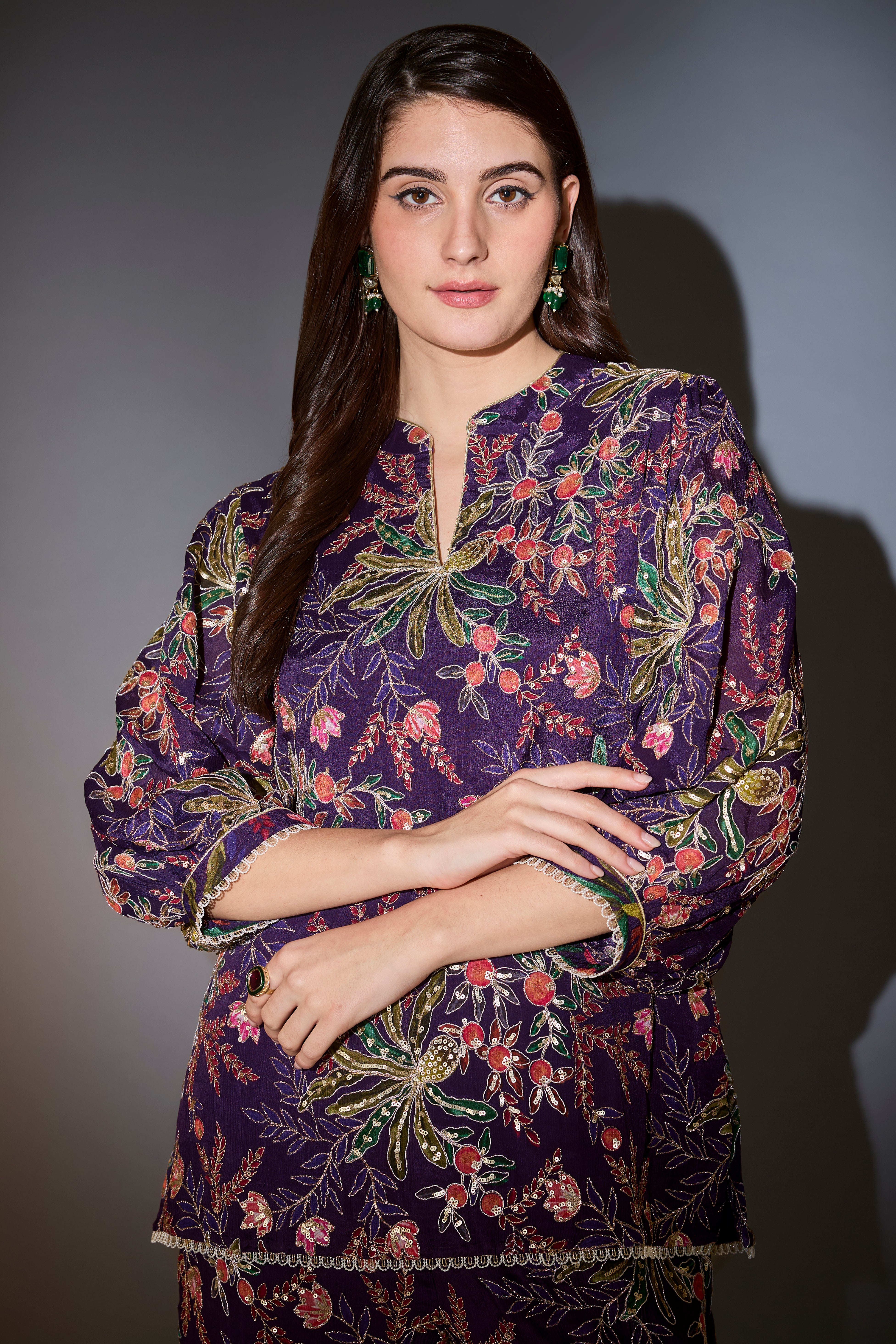 Short purple sharara set with all-over multi-thread floral embroidery highlighted with intricate aari work.