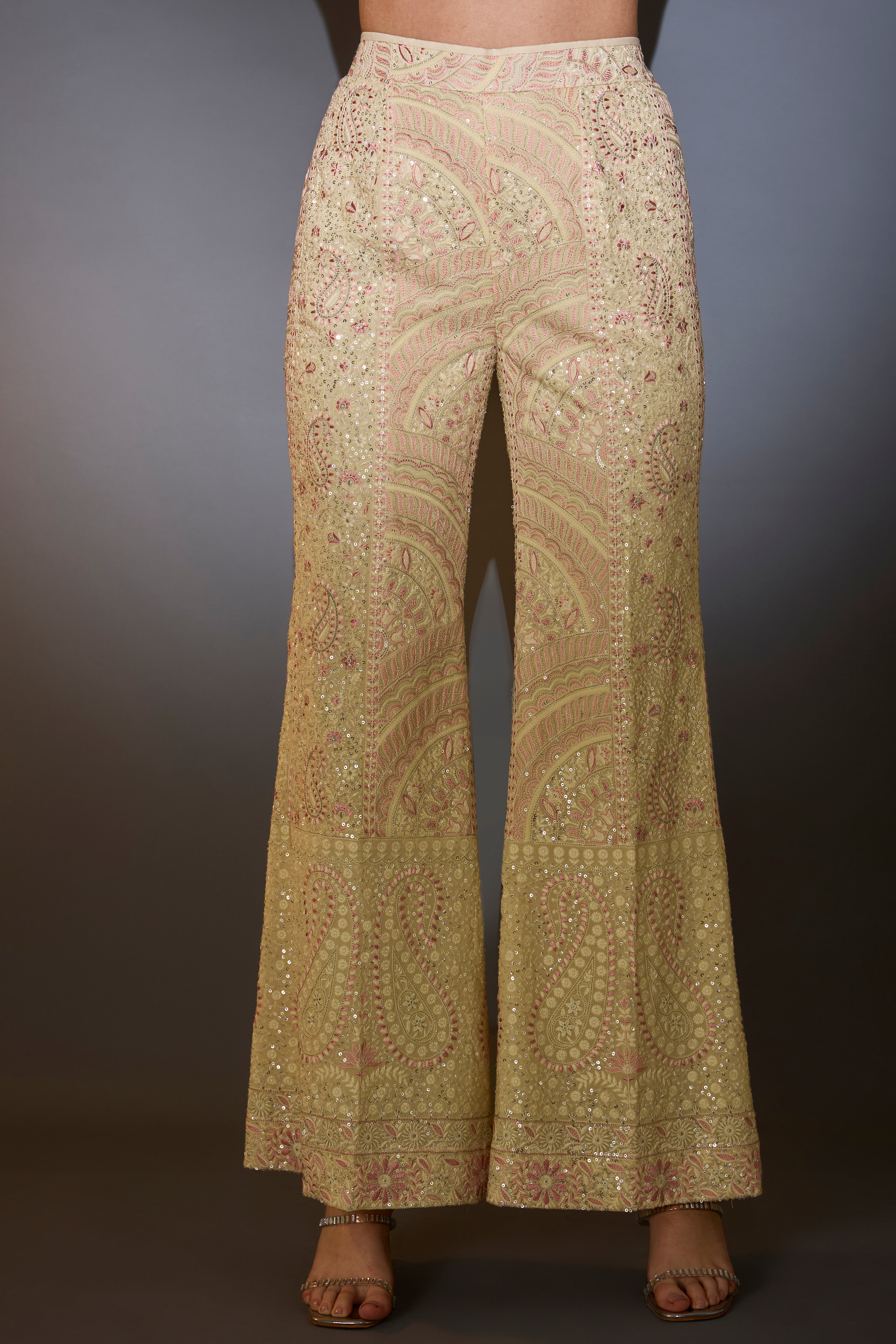 Cream chikankari co-ord set with intricate pink thread work and sequin embroidery.