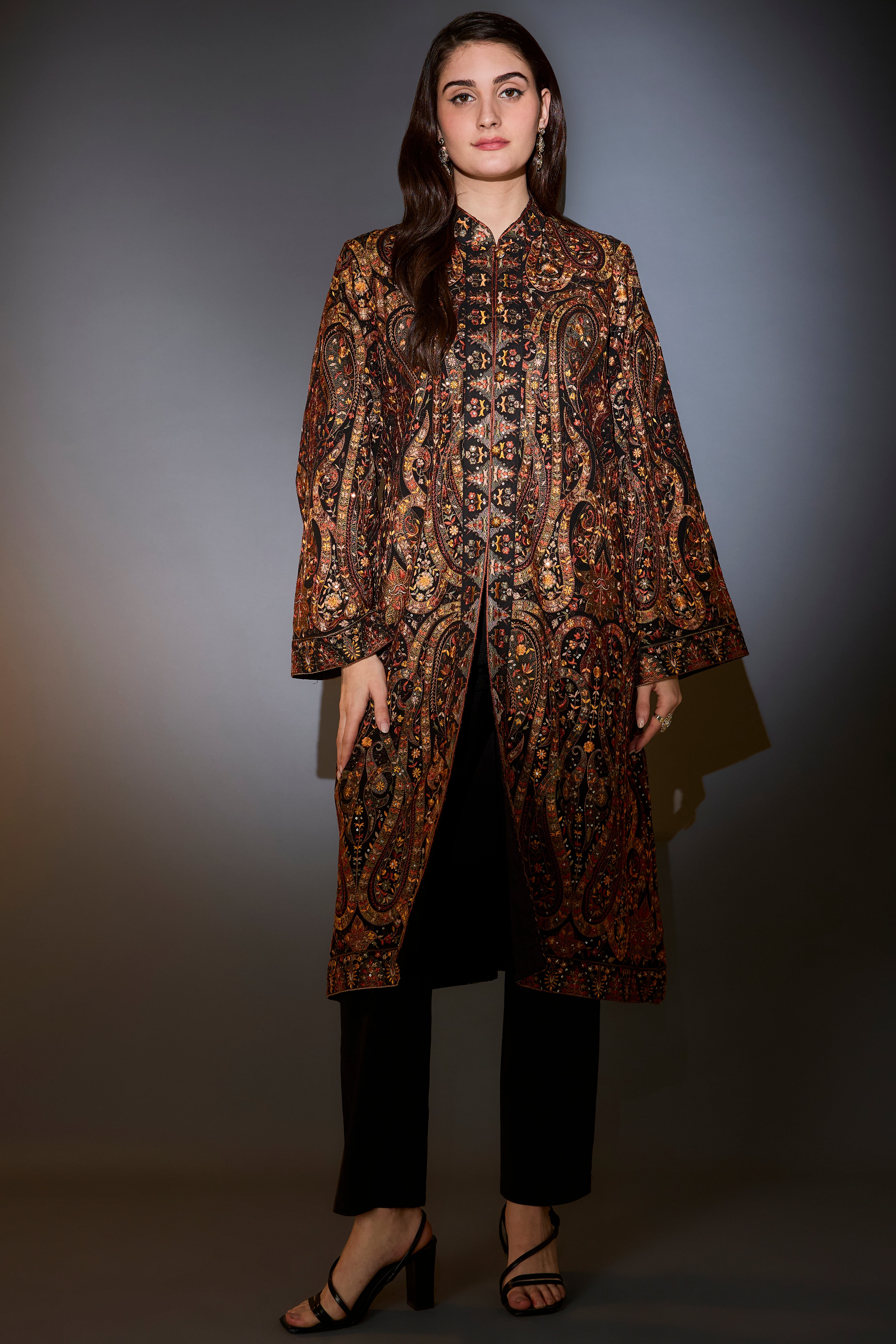 Black kashmiri jamawar emroidered long jacket.