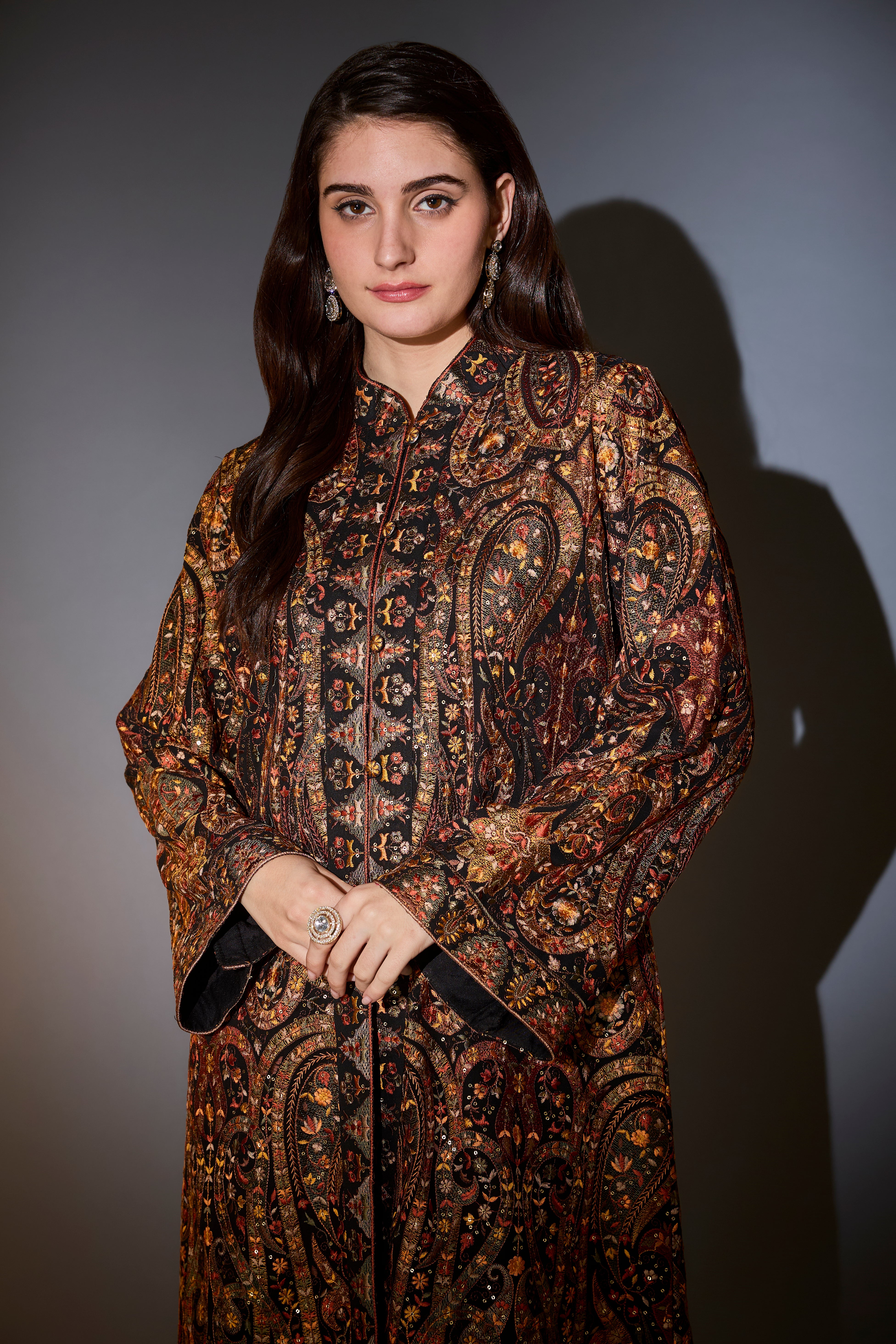 Black kashmiri jamawar emroidered long jacket.