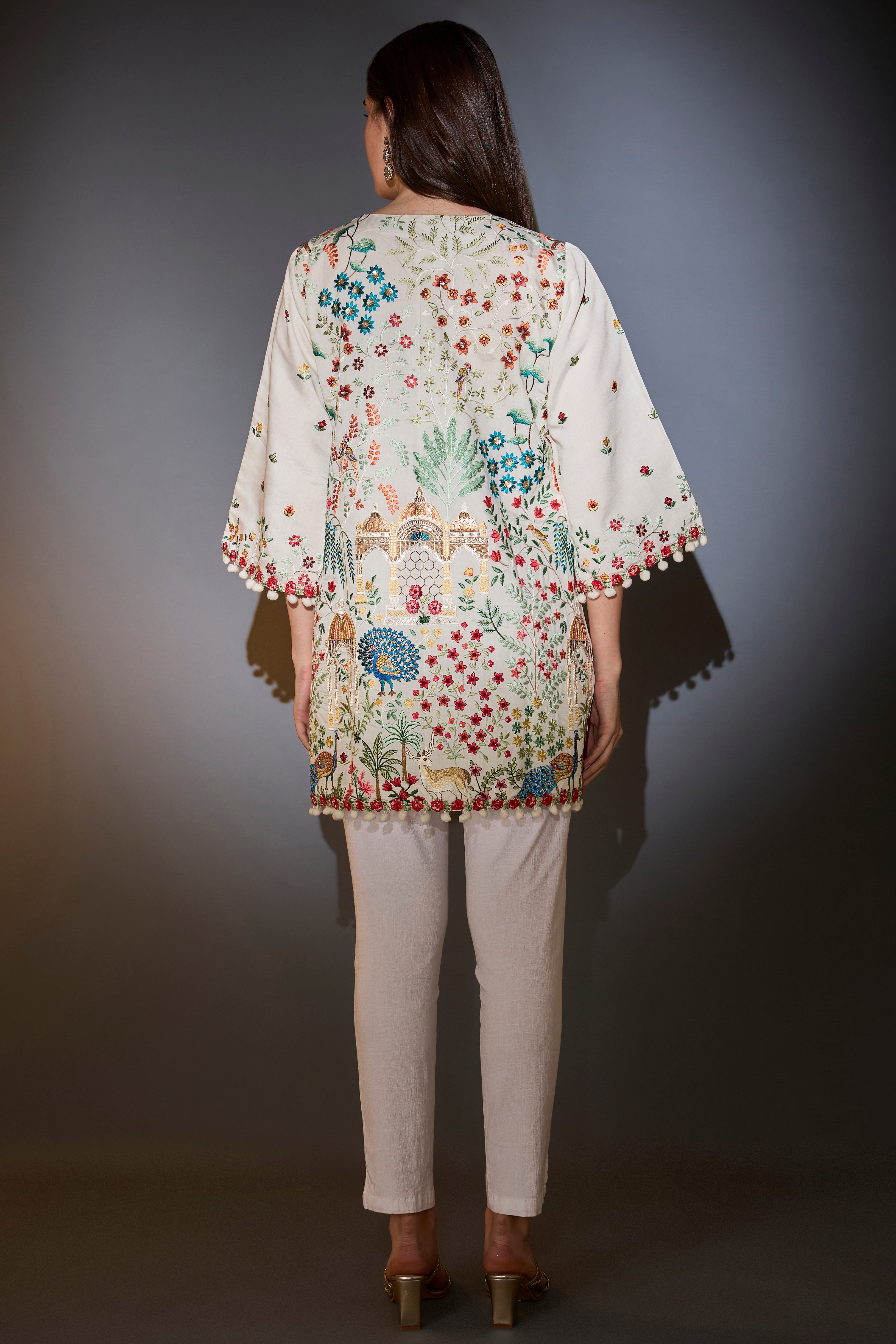 White multi-thread work, flora and fauna embroidered tunic.