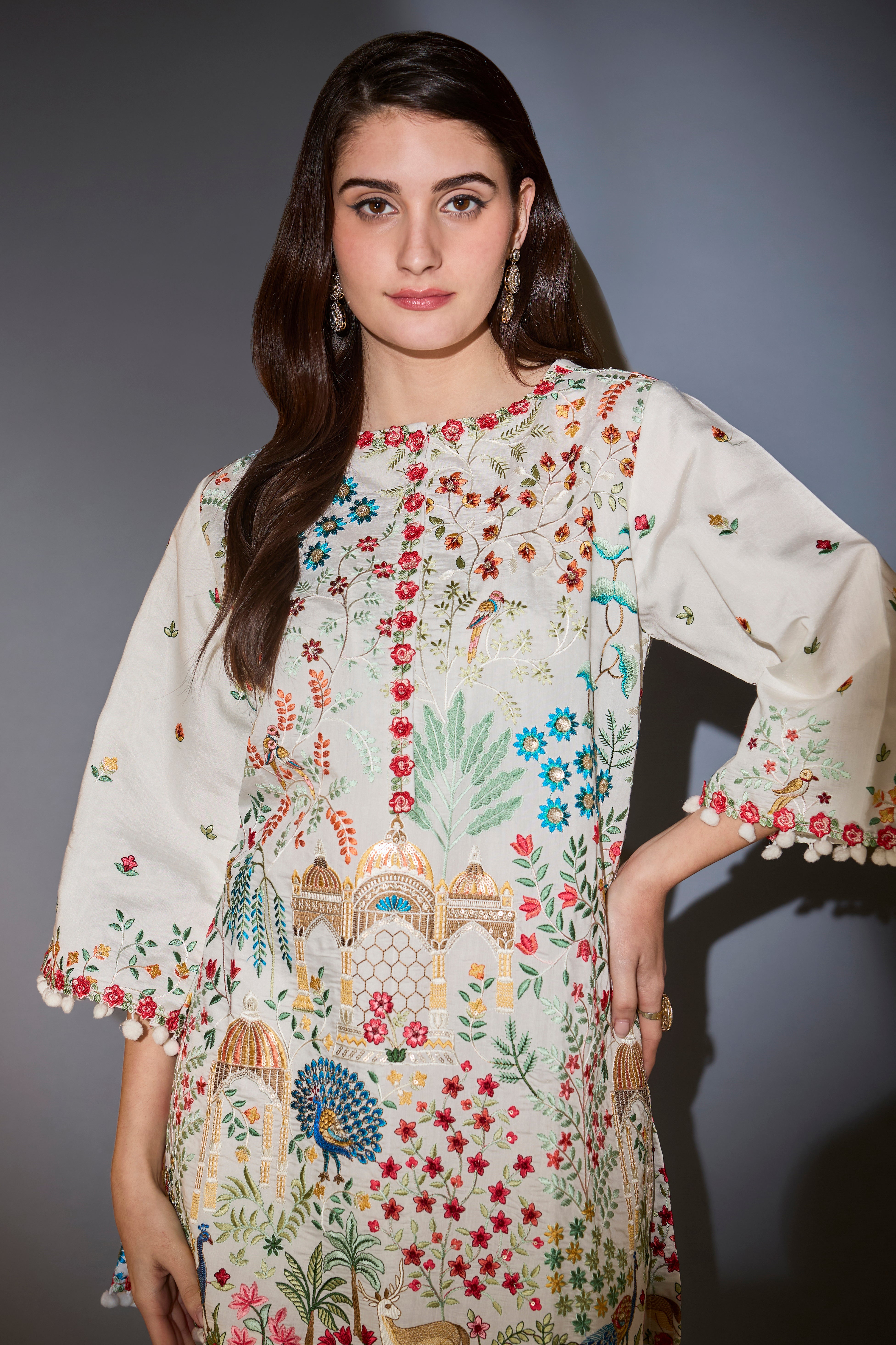 White multi-thread work, flora and fauna embroidered tunic.