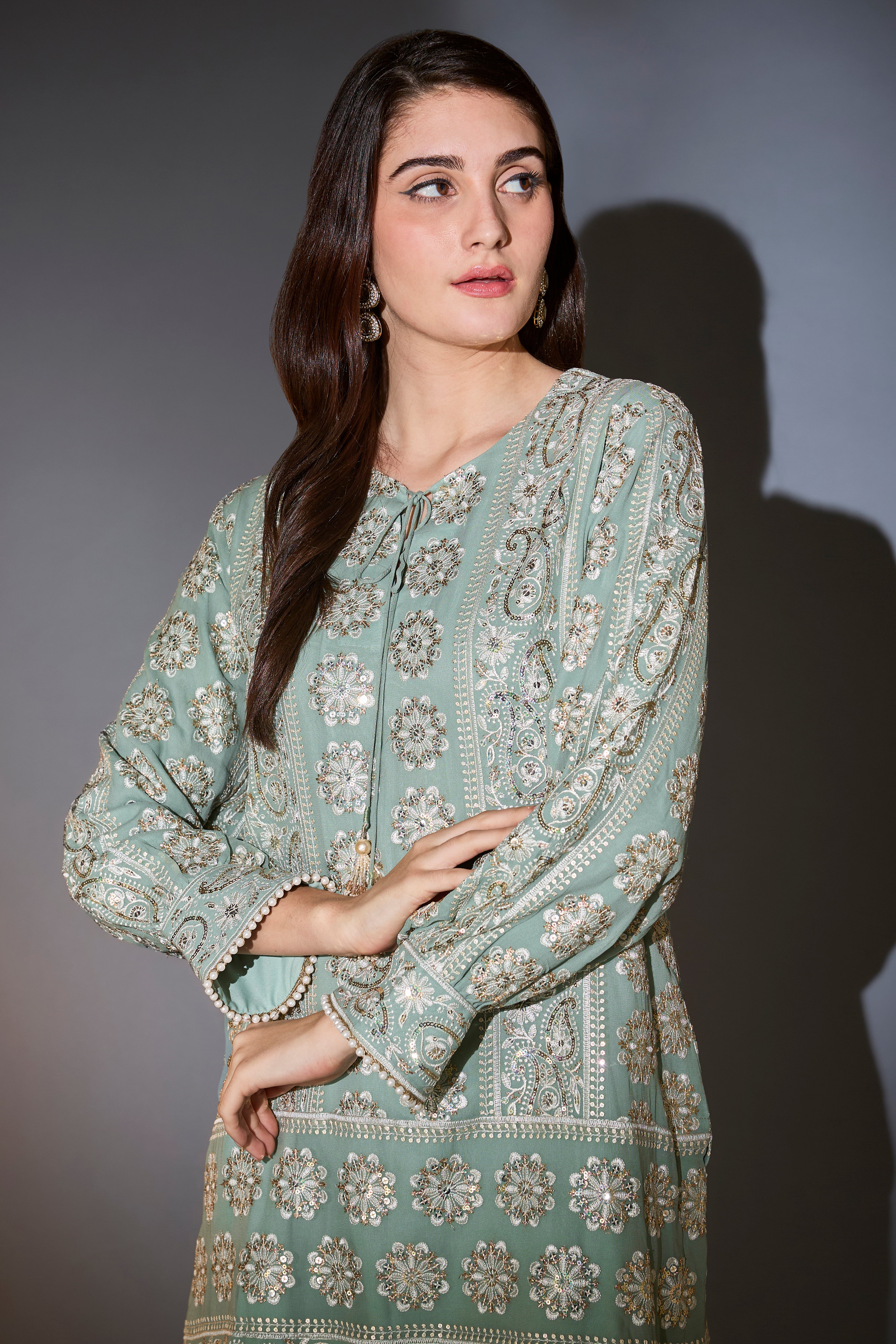 Sage green chikankari tunic with sequins.