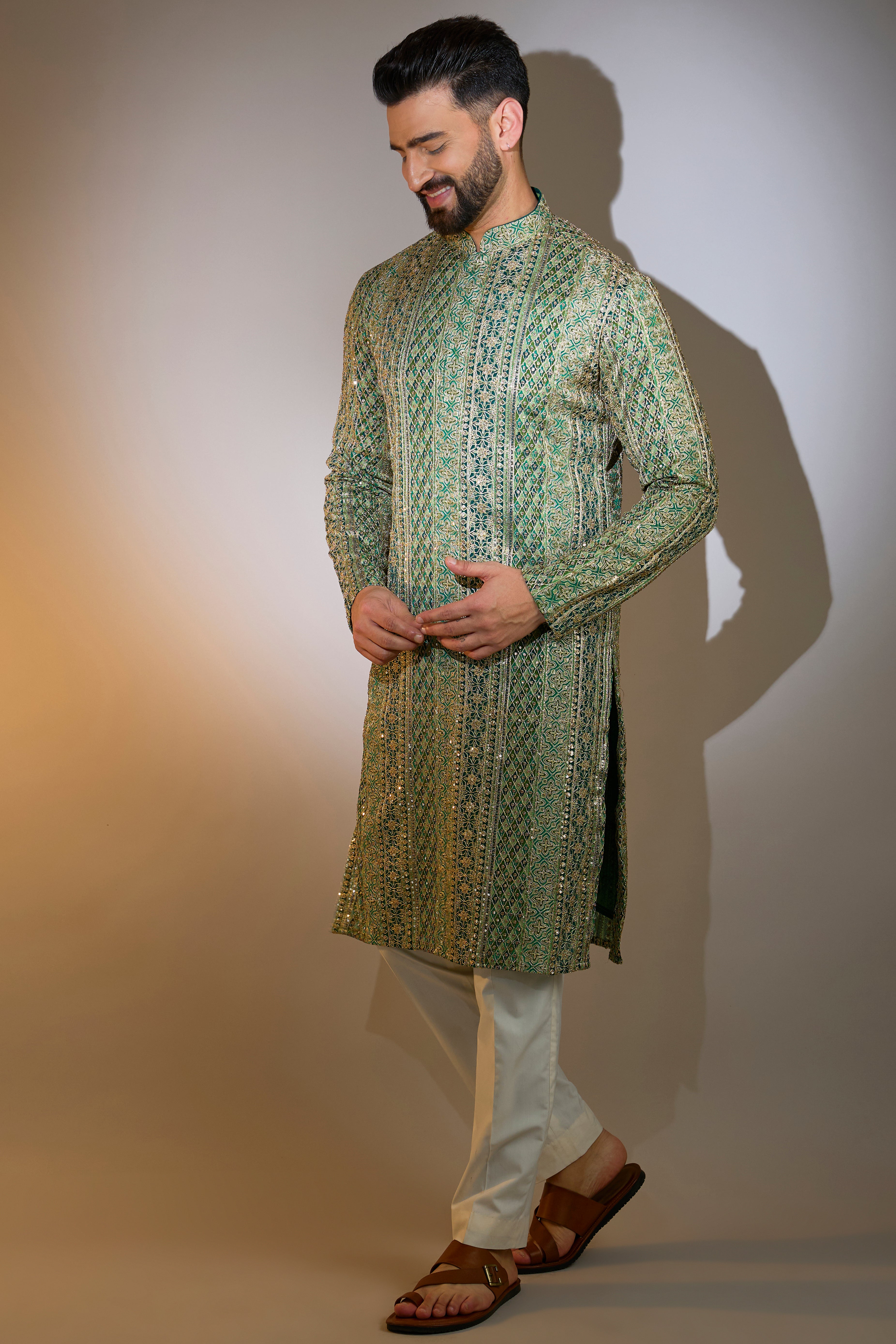 green formal kurta with heavy zari detailing