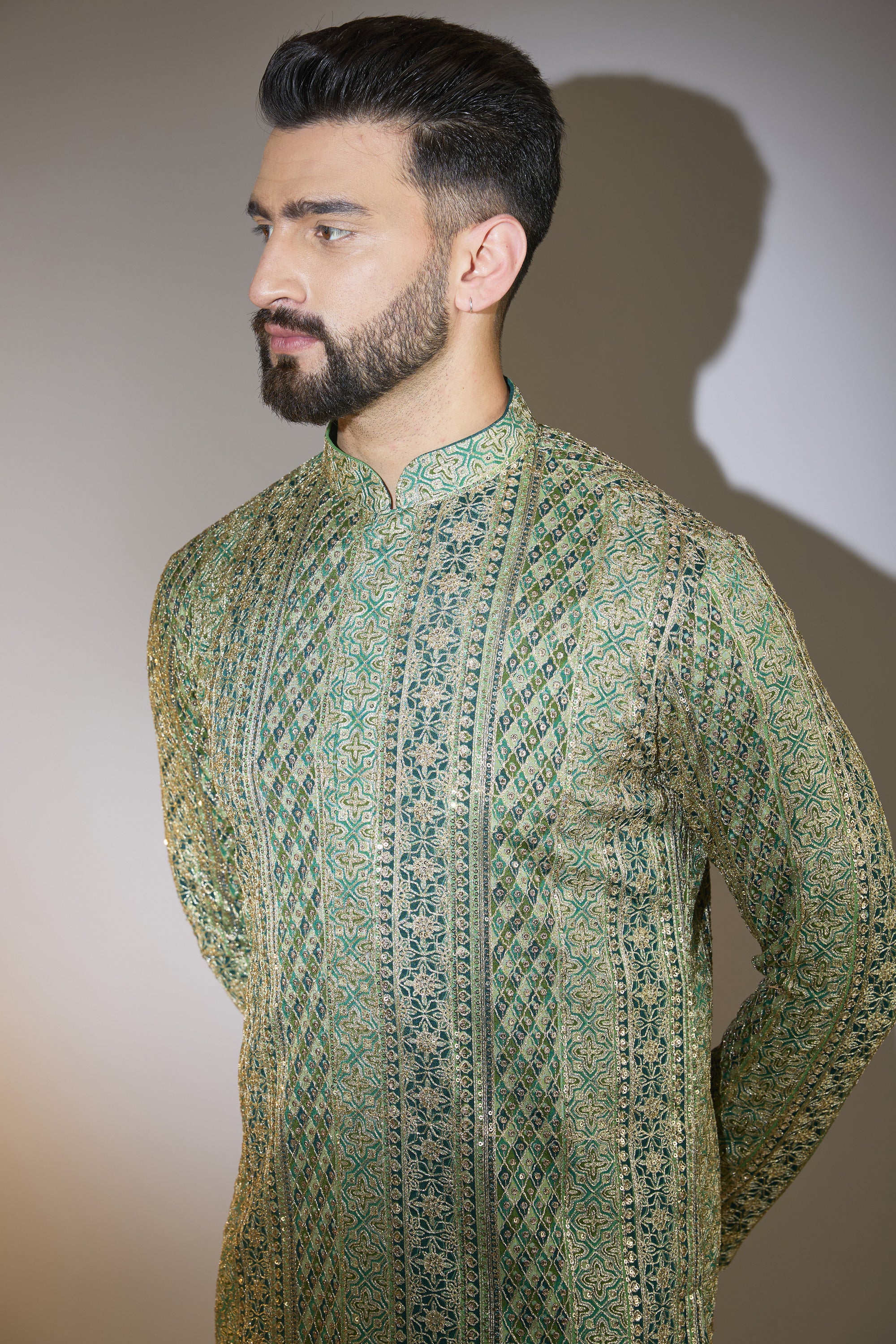 green formal kurta with heavy zari detailing