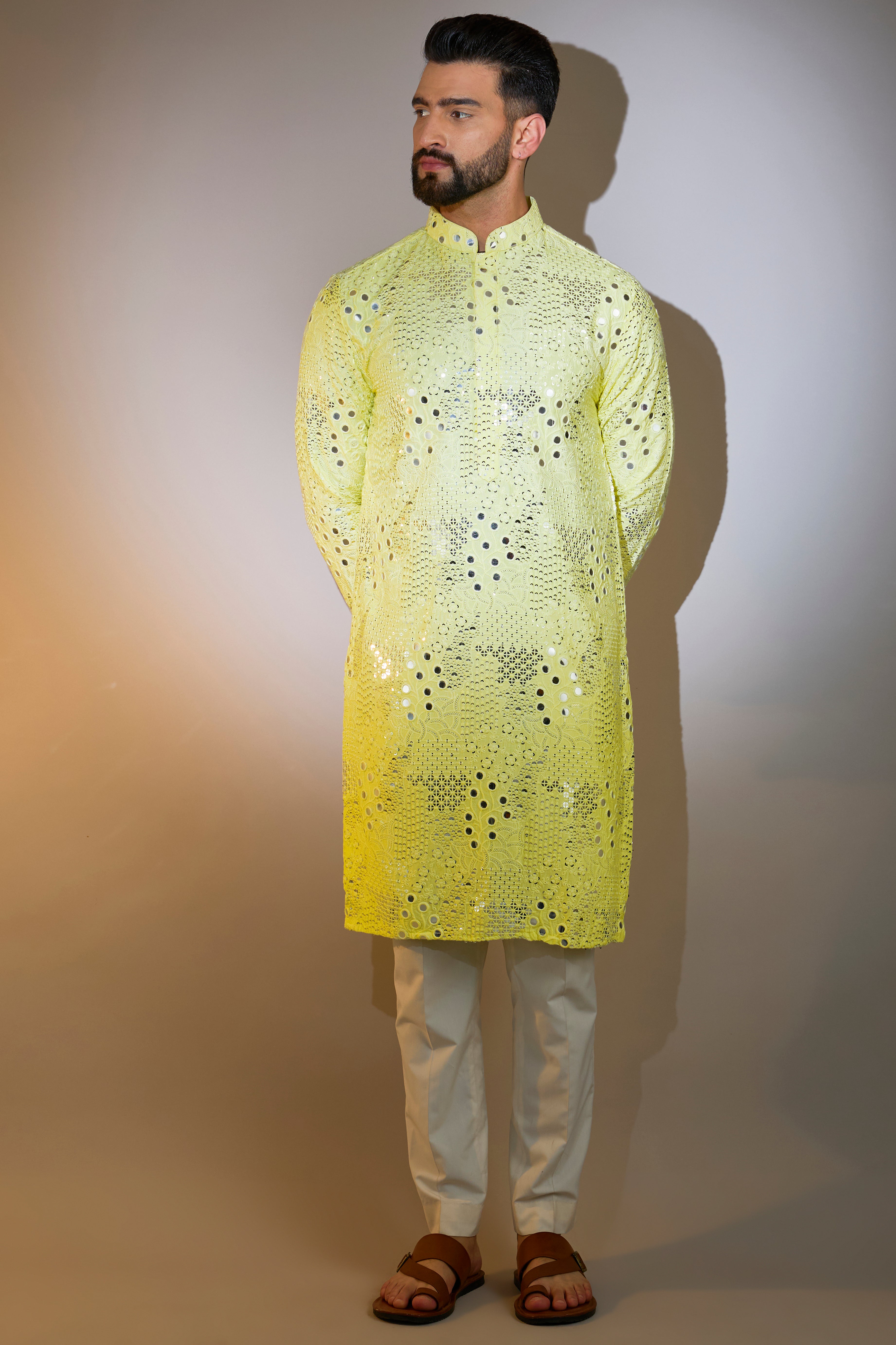 yellow mirror work kurta with intricate sequin work