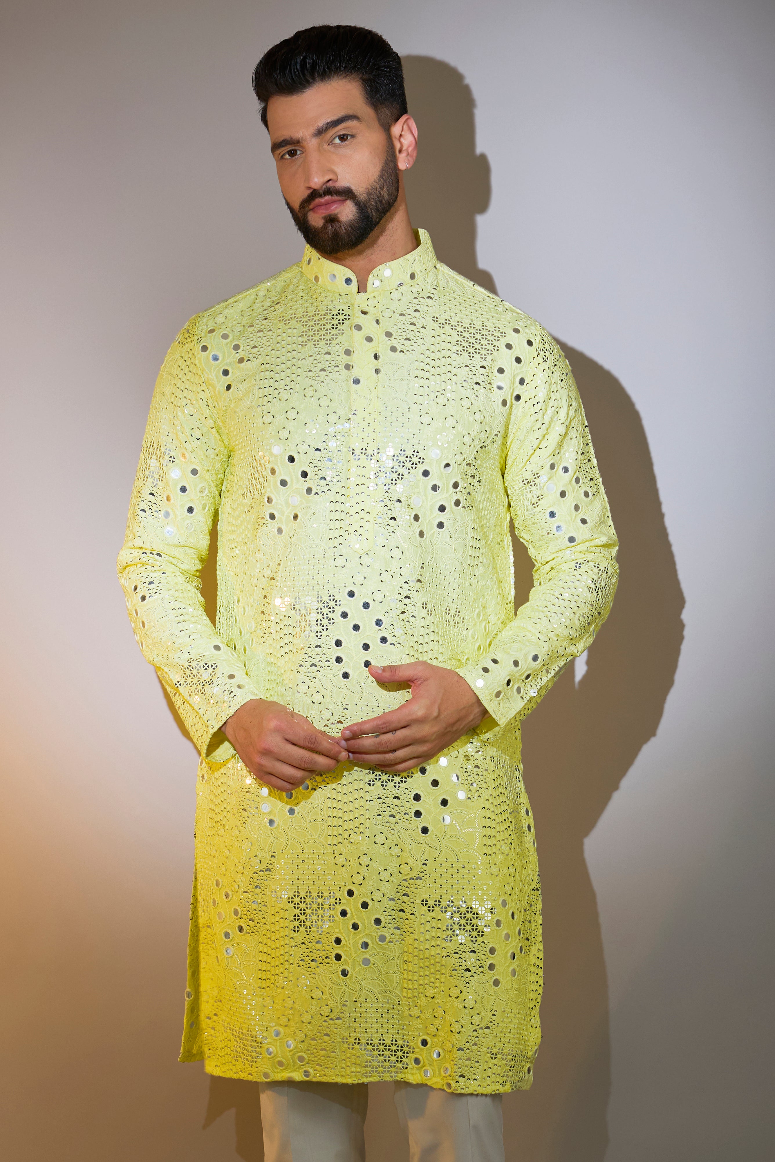 yellow mirror work kurta with intricate sequin work