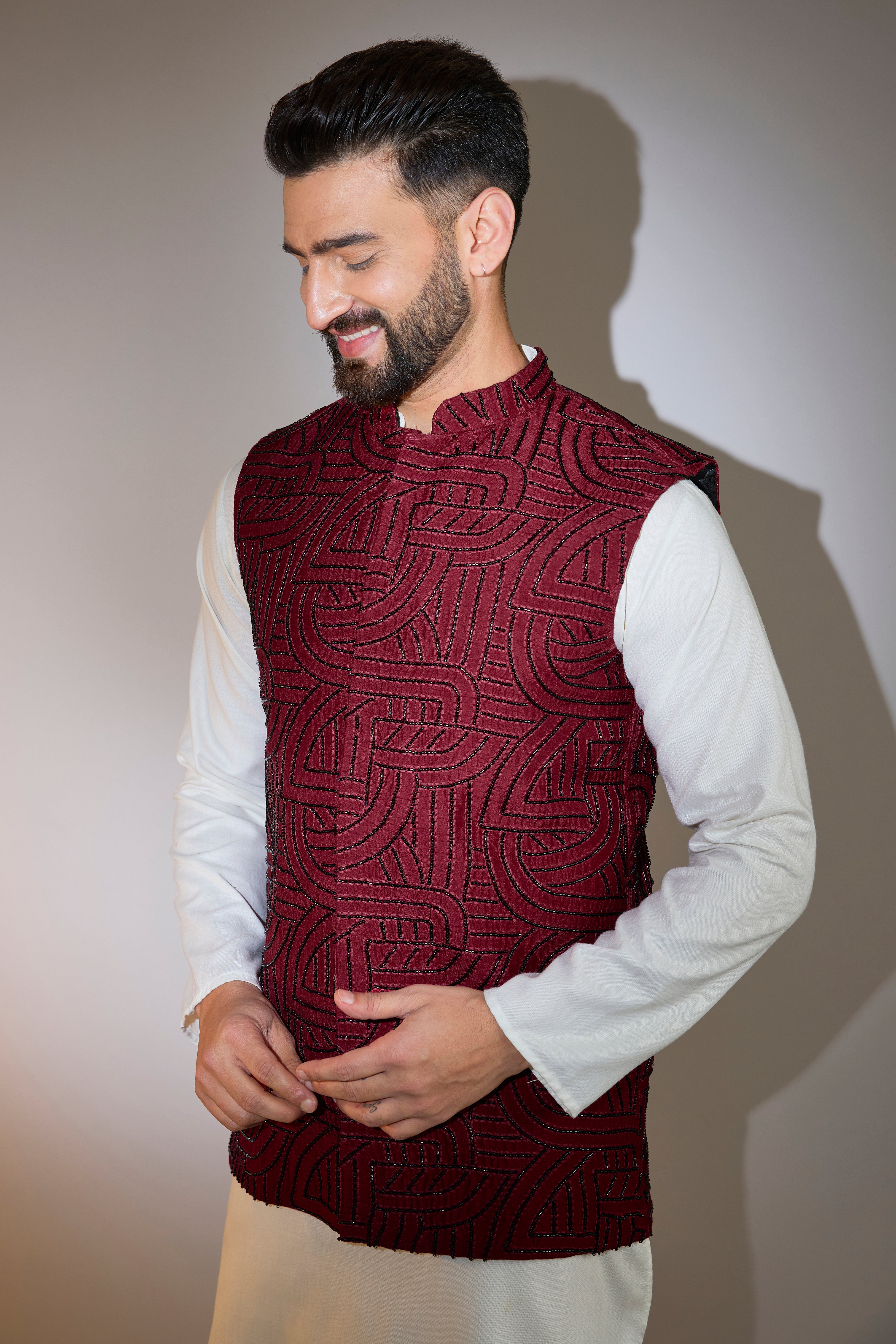 maroon short jacket with intricate cut dana embroidery