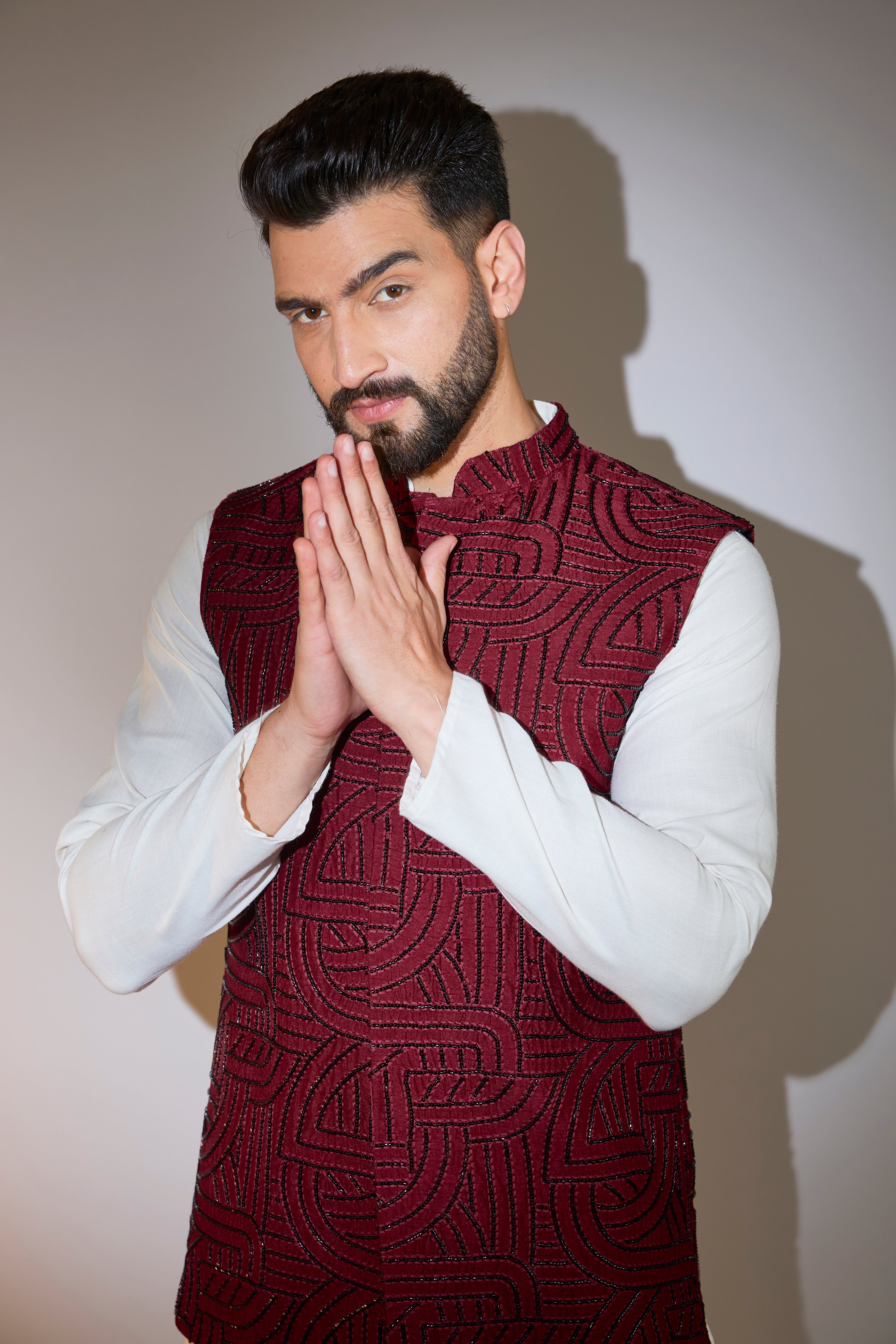 maroon short jacket with intricate cut dana embroidery