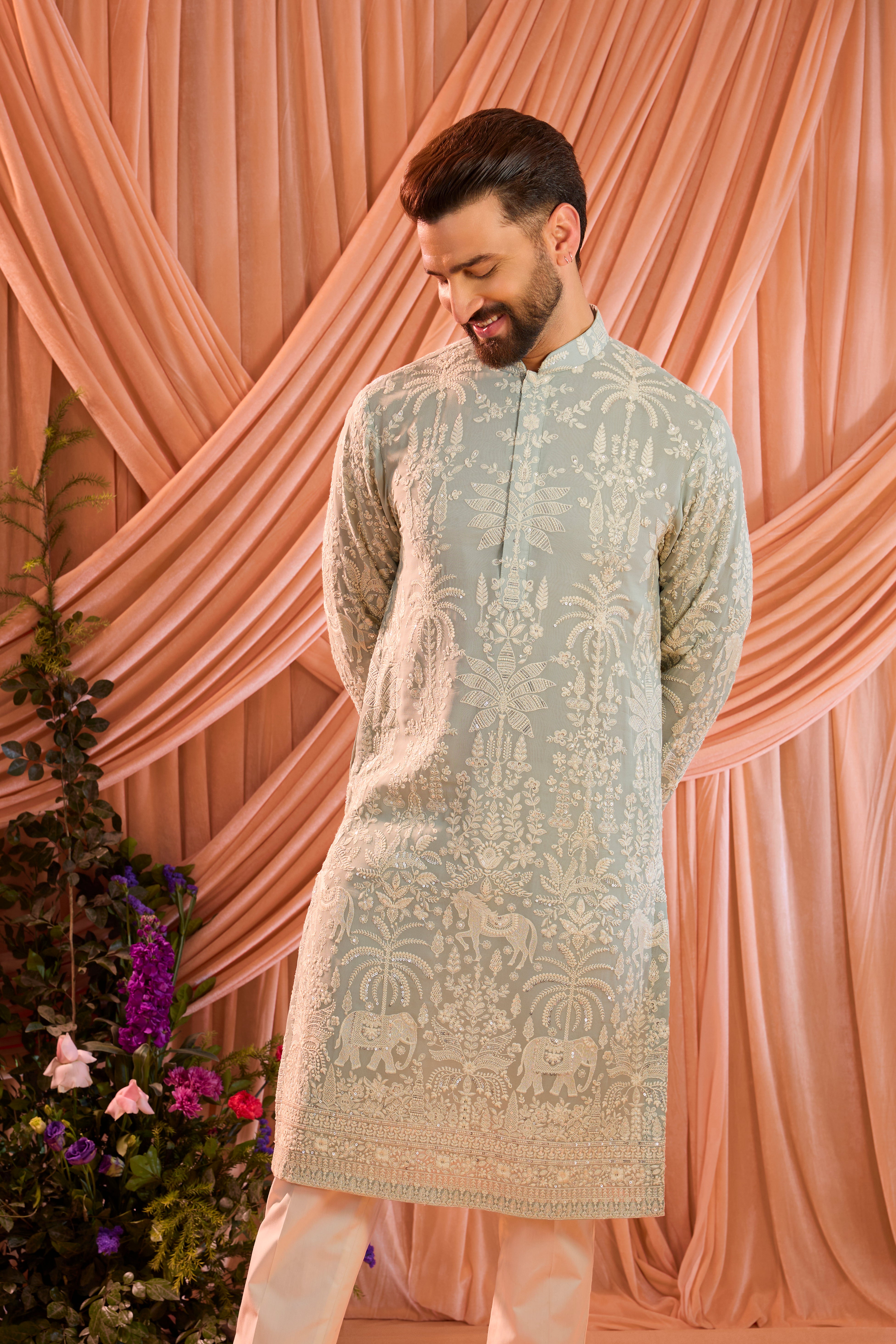 Blue chikankari kurta with delaited flora and fauna embroidery