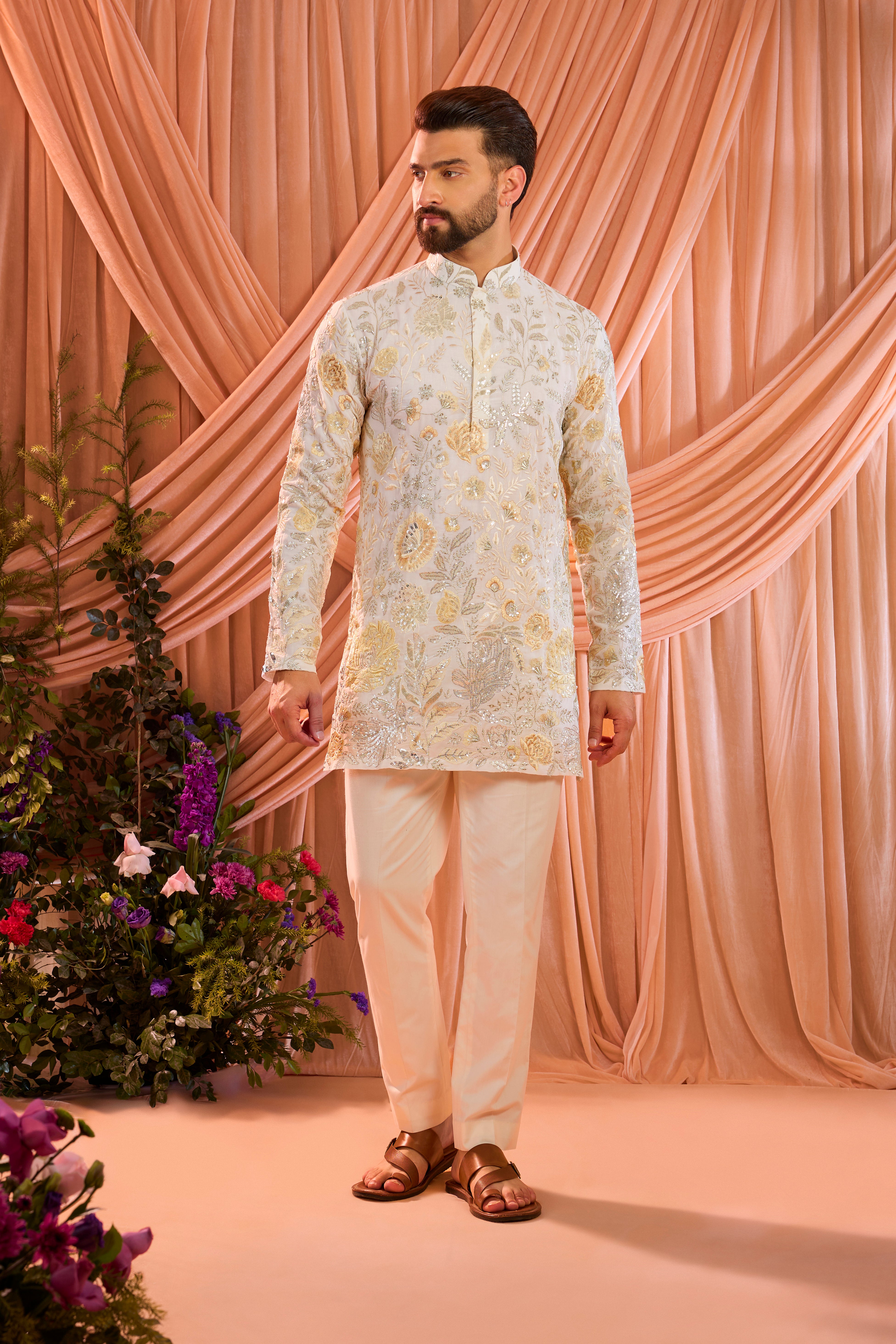 White chikankari kurta with detailed floral embroidery