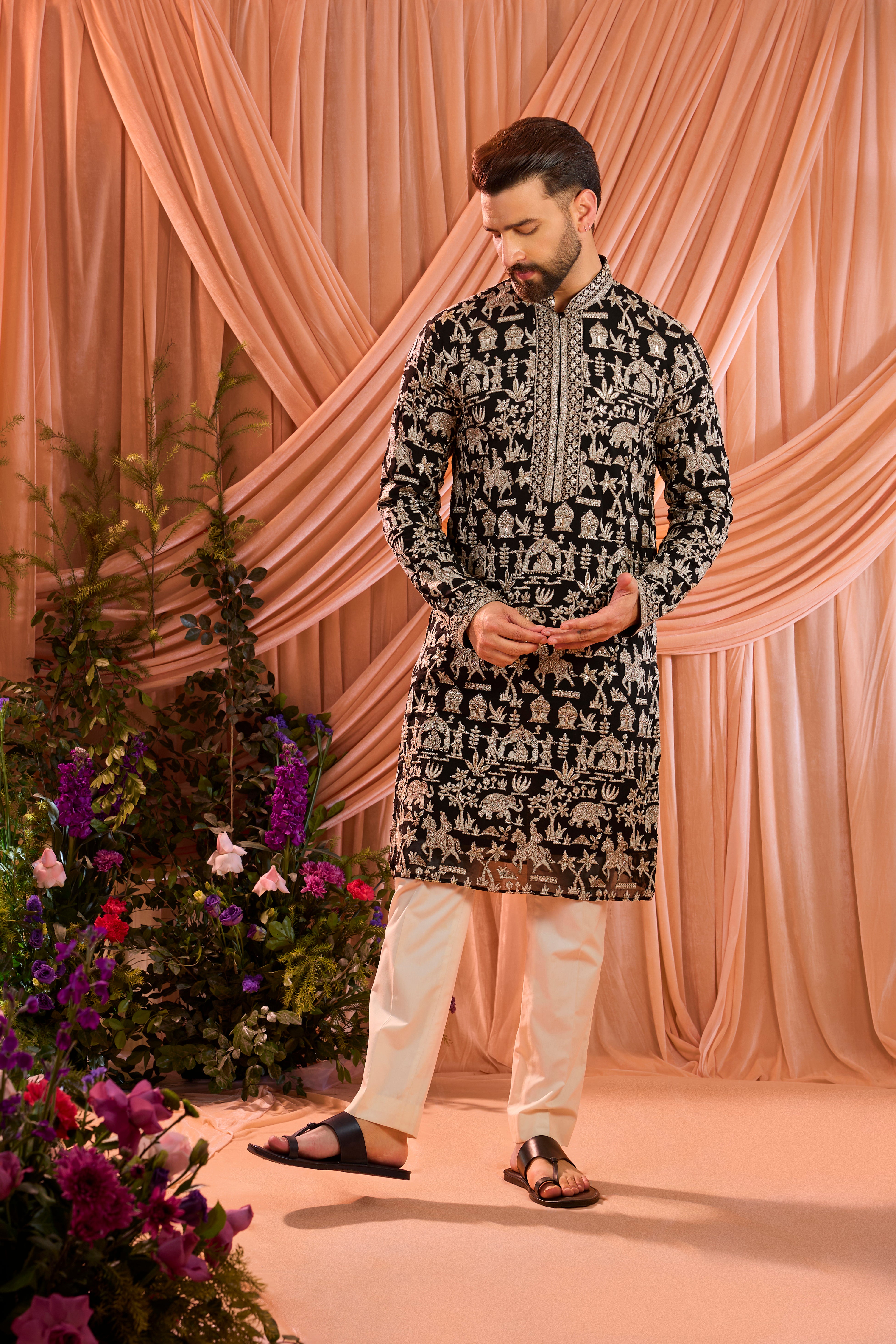 Black zari kurta with detailed mughal era embroidery and heavy zari work