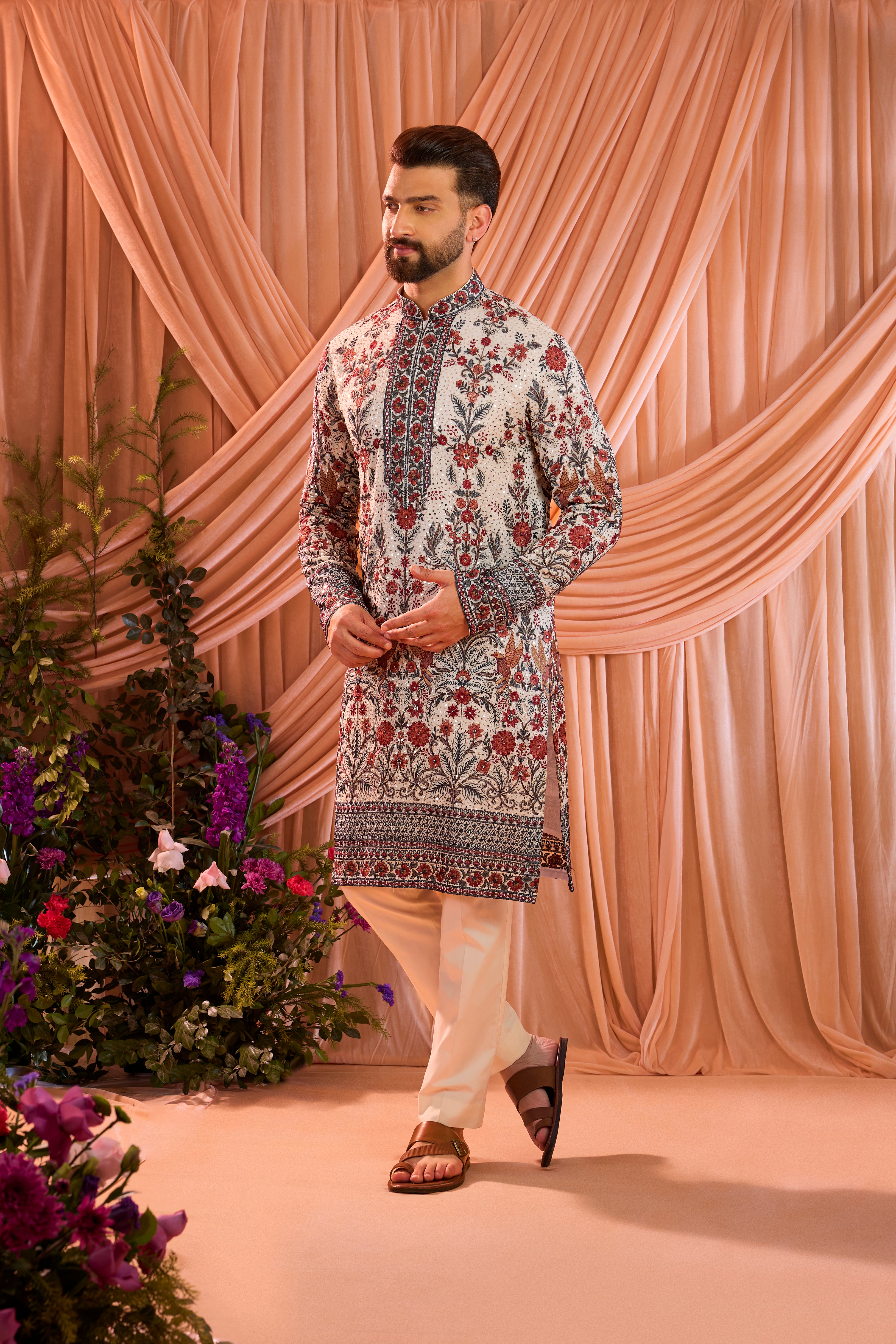White chikankari kurta with detailed floral embroidery and sequin