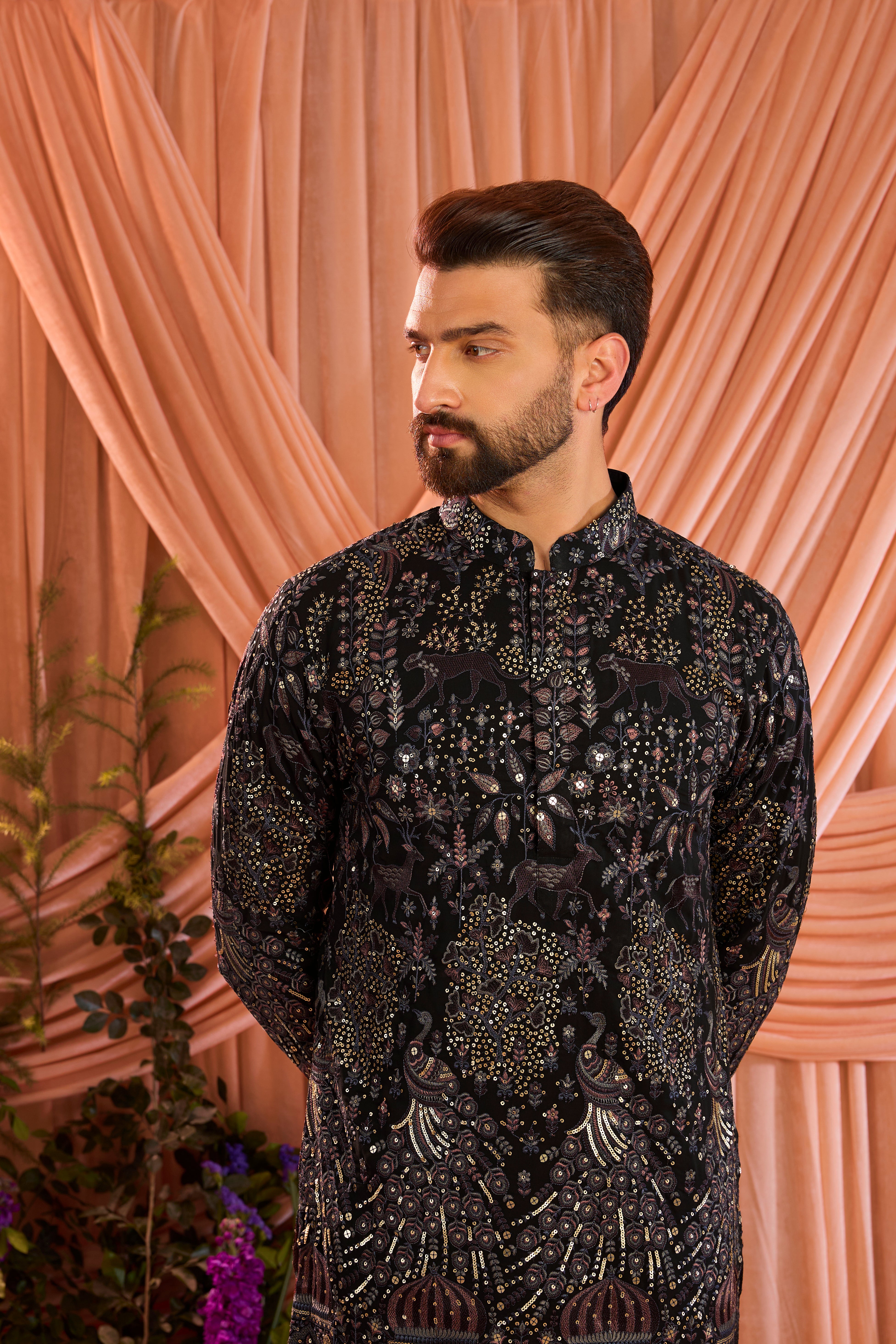 A blue/multi coloured royal heritage kurta adorned with detailed flora and fauna motifs and intricate darbar scenes.