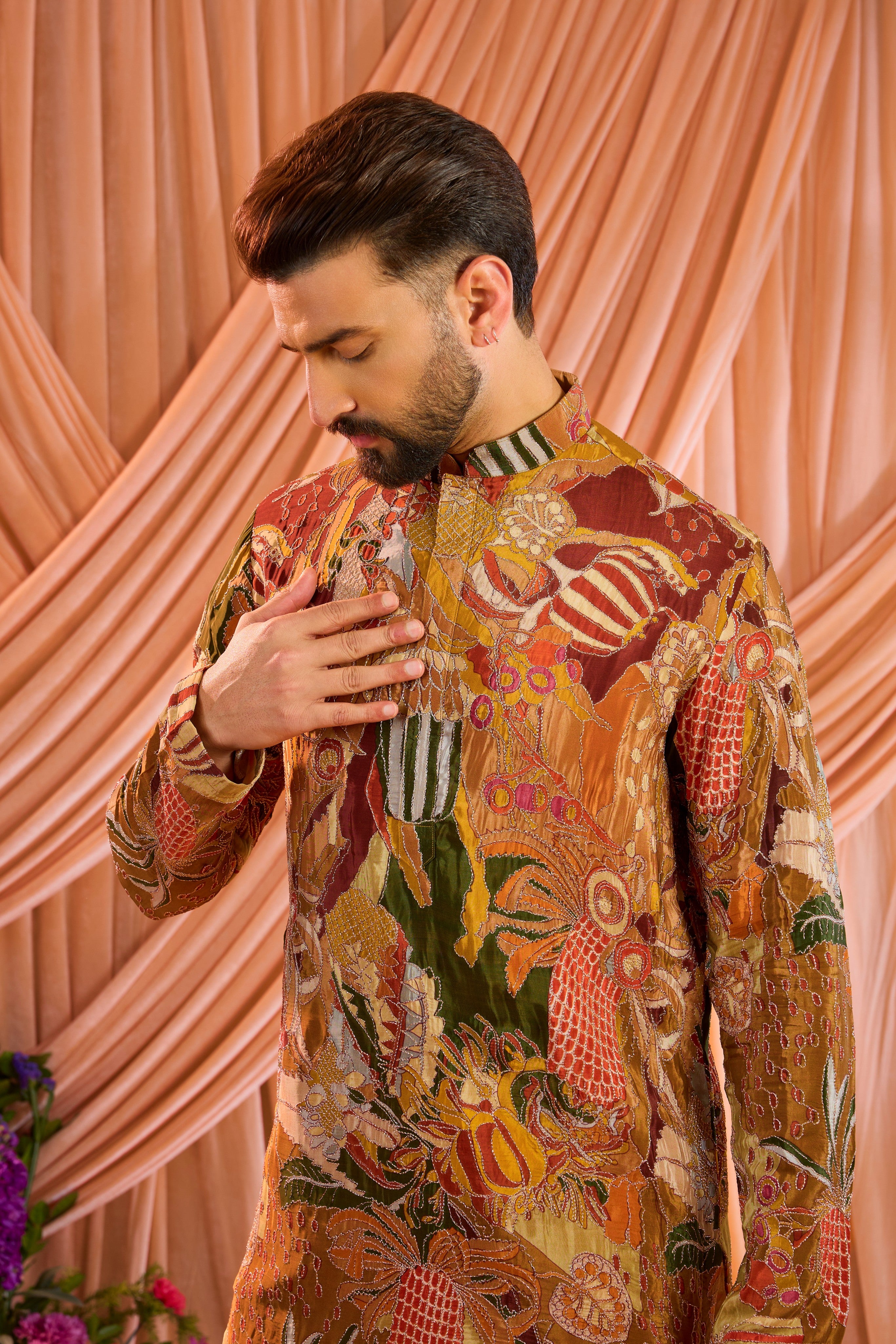 A multicoloured abstract kurta crafted on fluid crepe, elevated with meticulously detailed zari work.