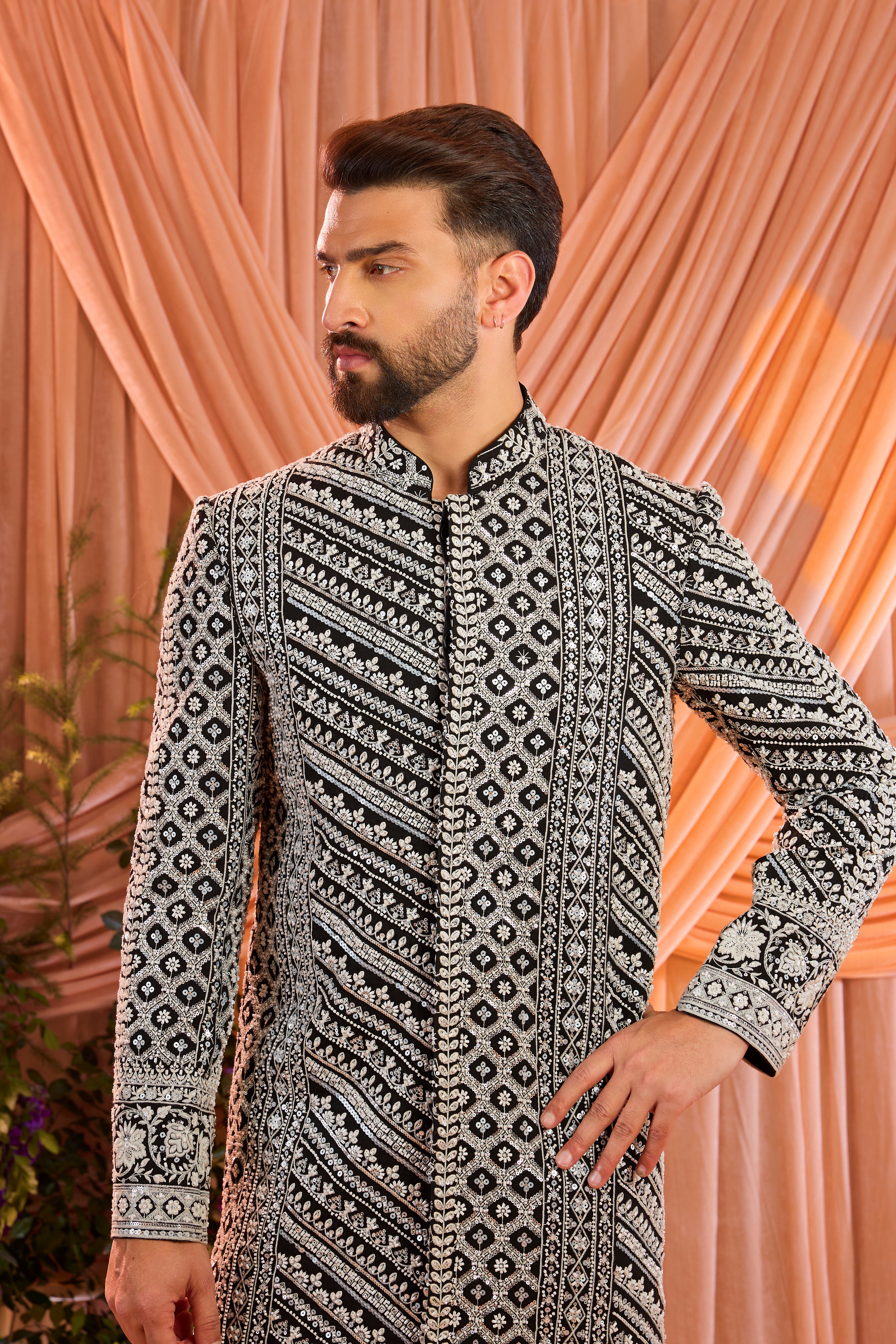 Black  hand-embroidered formal sherwani , exquisitely adorned with intricate ivory cut-dana detailing.