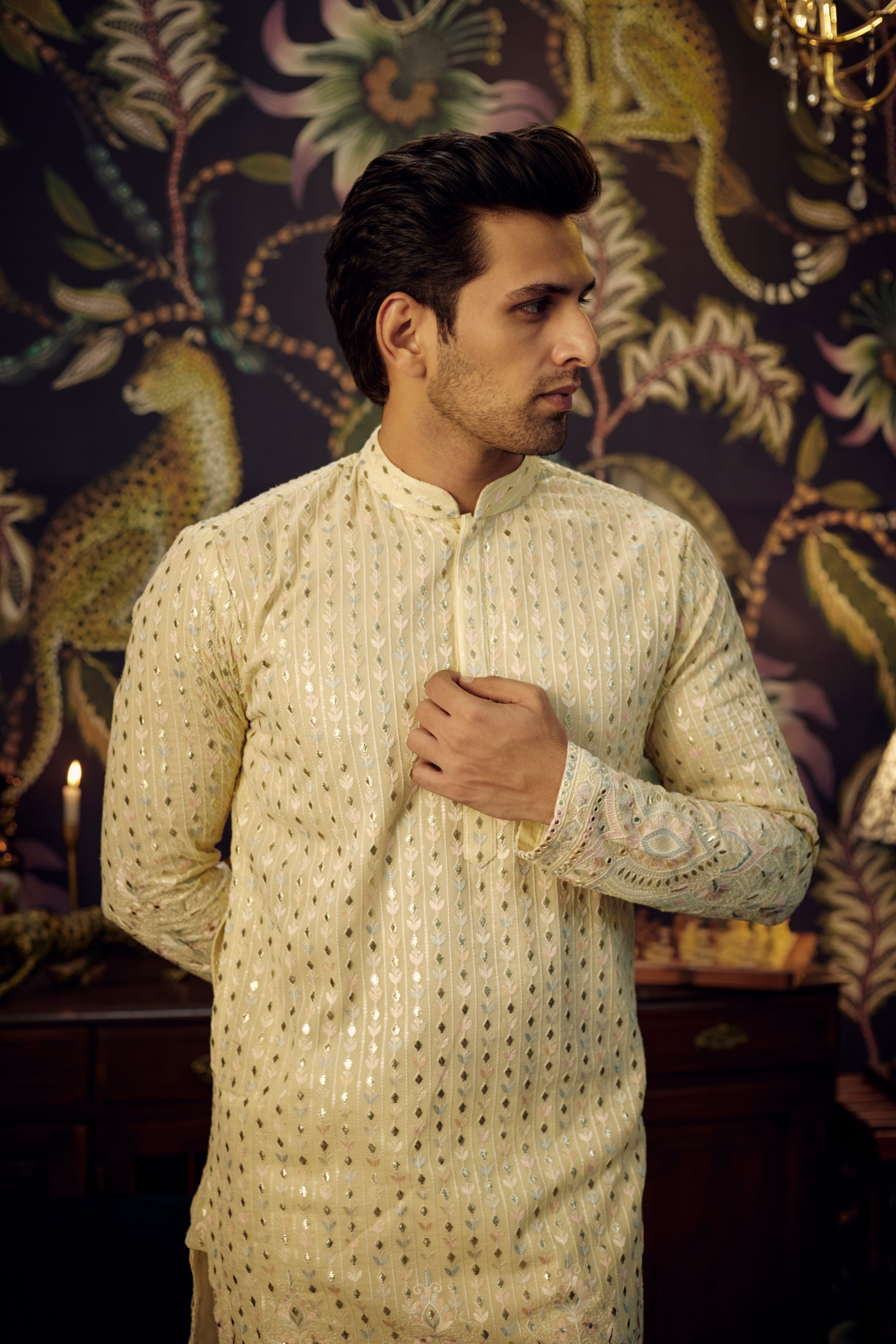 Cream Chikankari Kurta with intricate multi-threadwork and detailed embroidered ghera. - kasbahmen