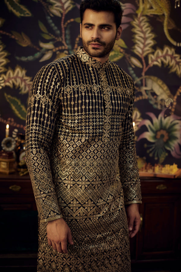 Black embroidered kurta with intricate antique golden threadwork.