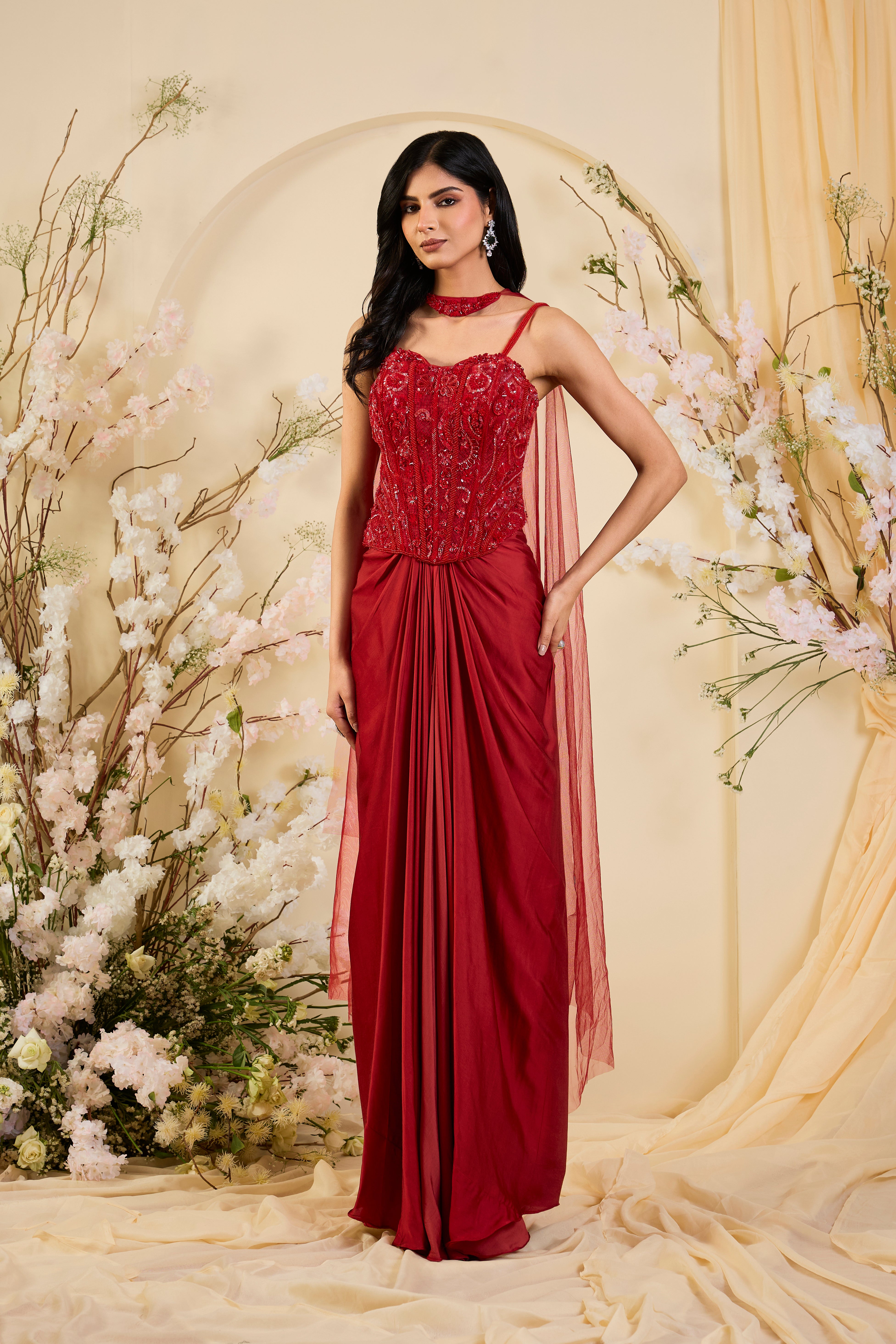 Rouge Royale: Draped Saree Gown with Hand-Embroidered Corset & Sheer Statement Cape