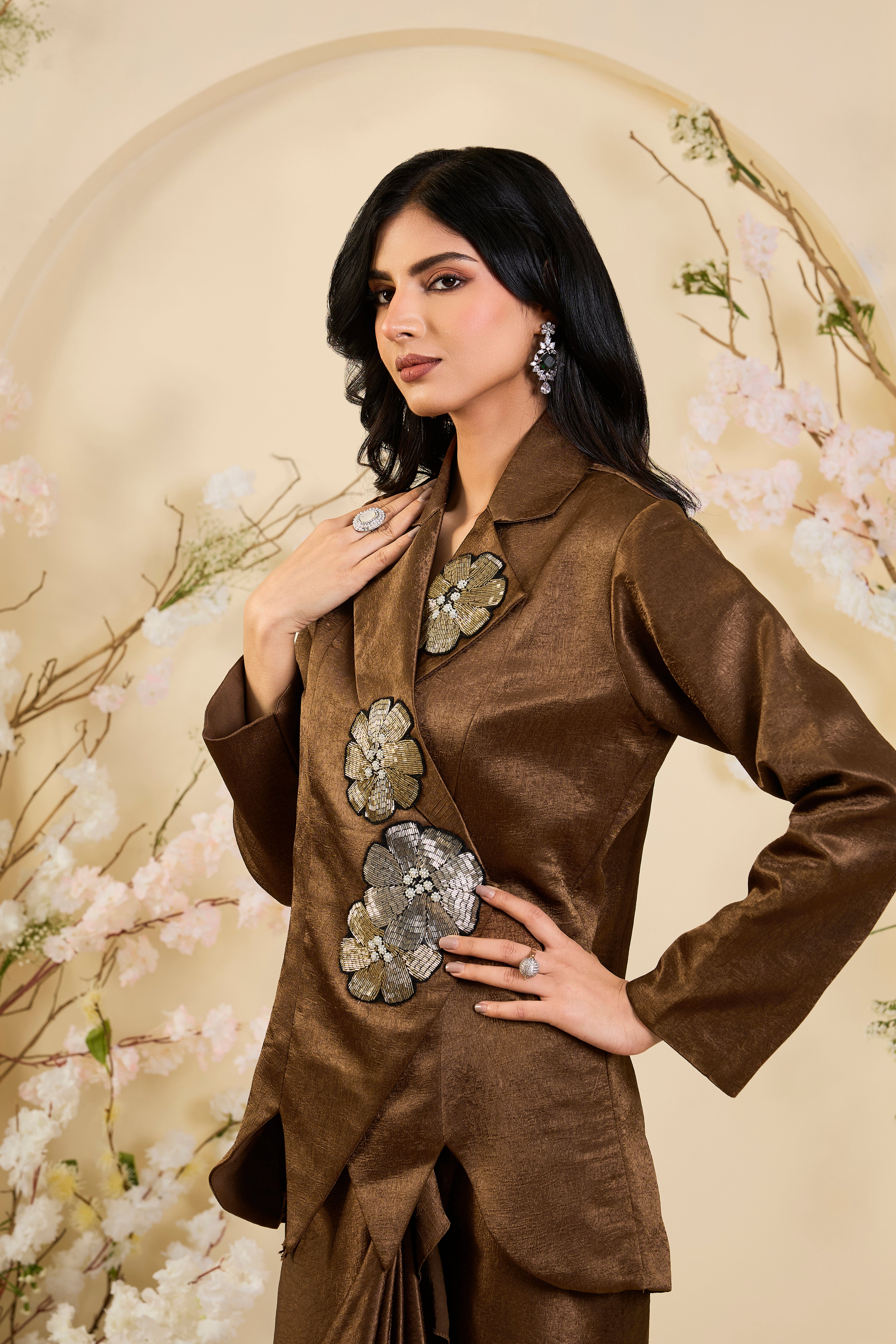 Bronze Éclat: Sculpted Drape Skirt Set with Tailored Jacket & Hand-Appliquéd Floral Embellishments