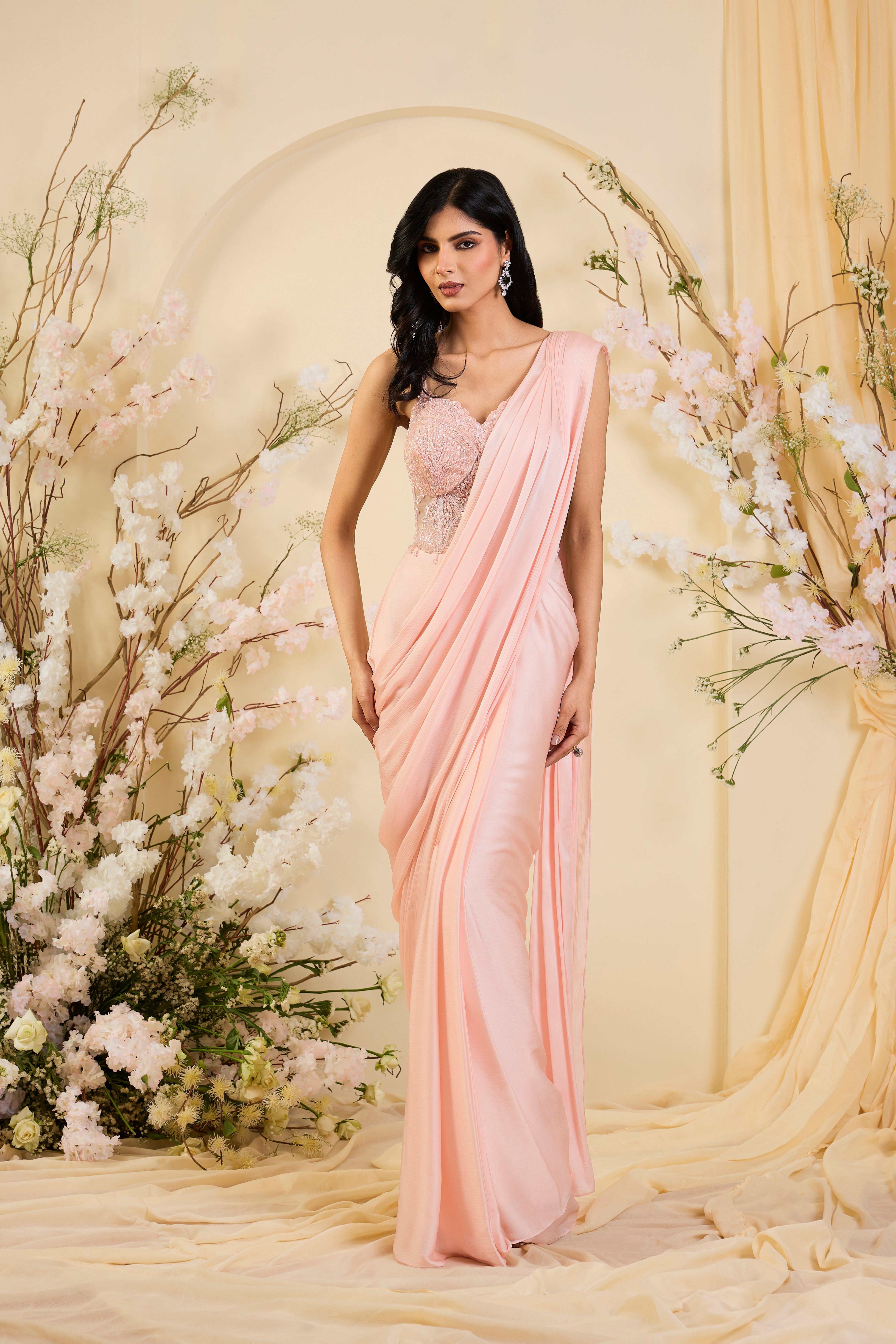 Blush Élan: Draped Saree Gown with Hand-Embellished Corset Bodice in Soft Rose Quartz Tones