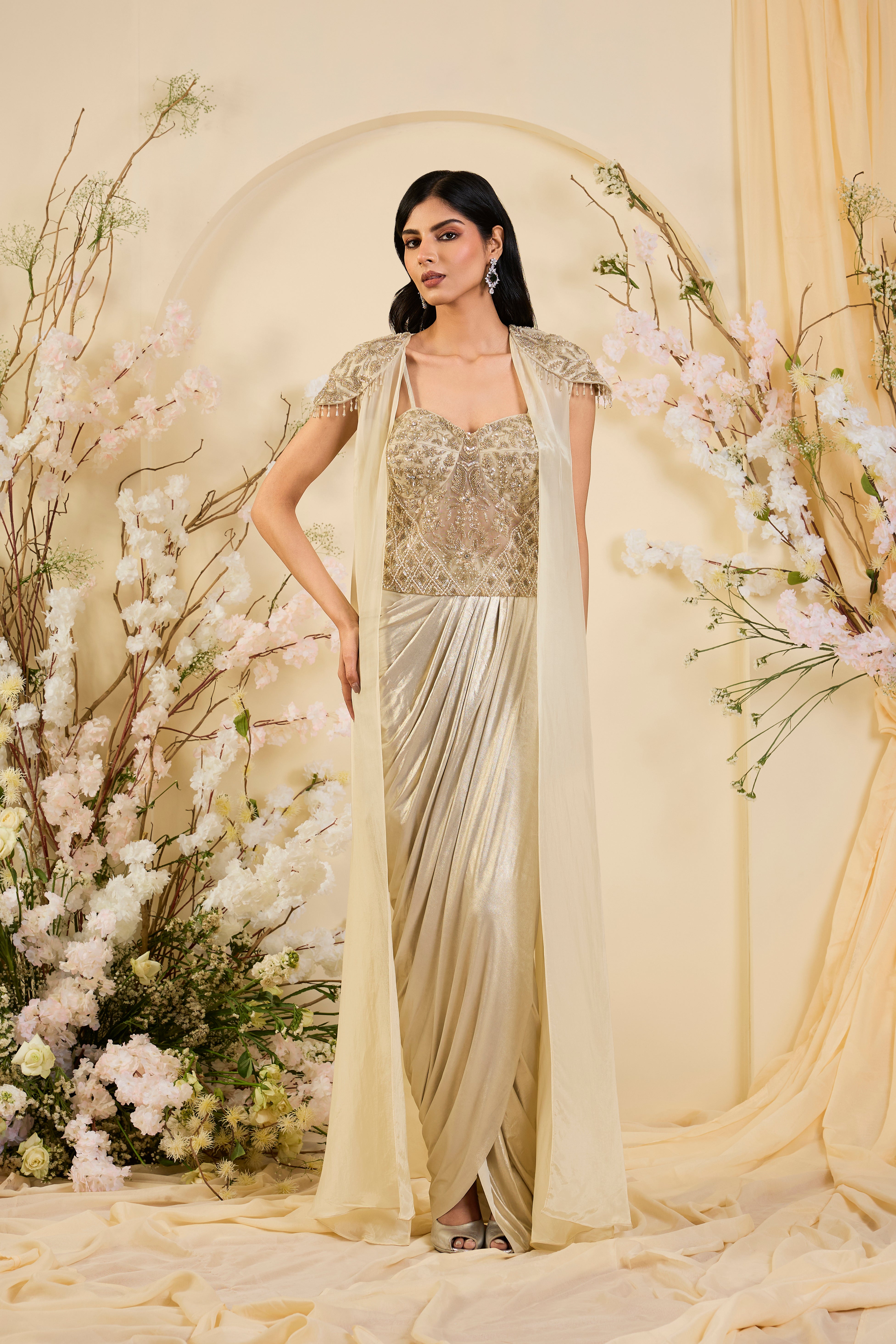 Champagne Drape Saree Gown with Hand-Embellished Corset Bodice & Sheer Cape Elegance