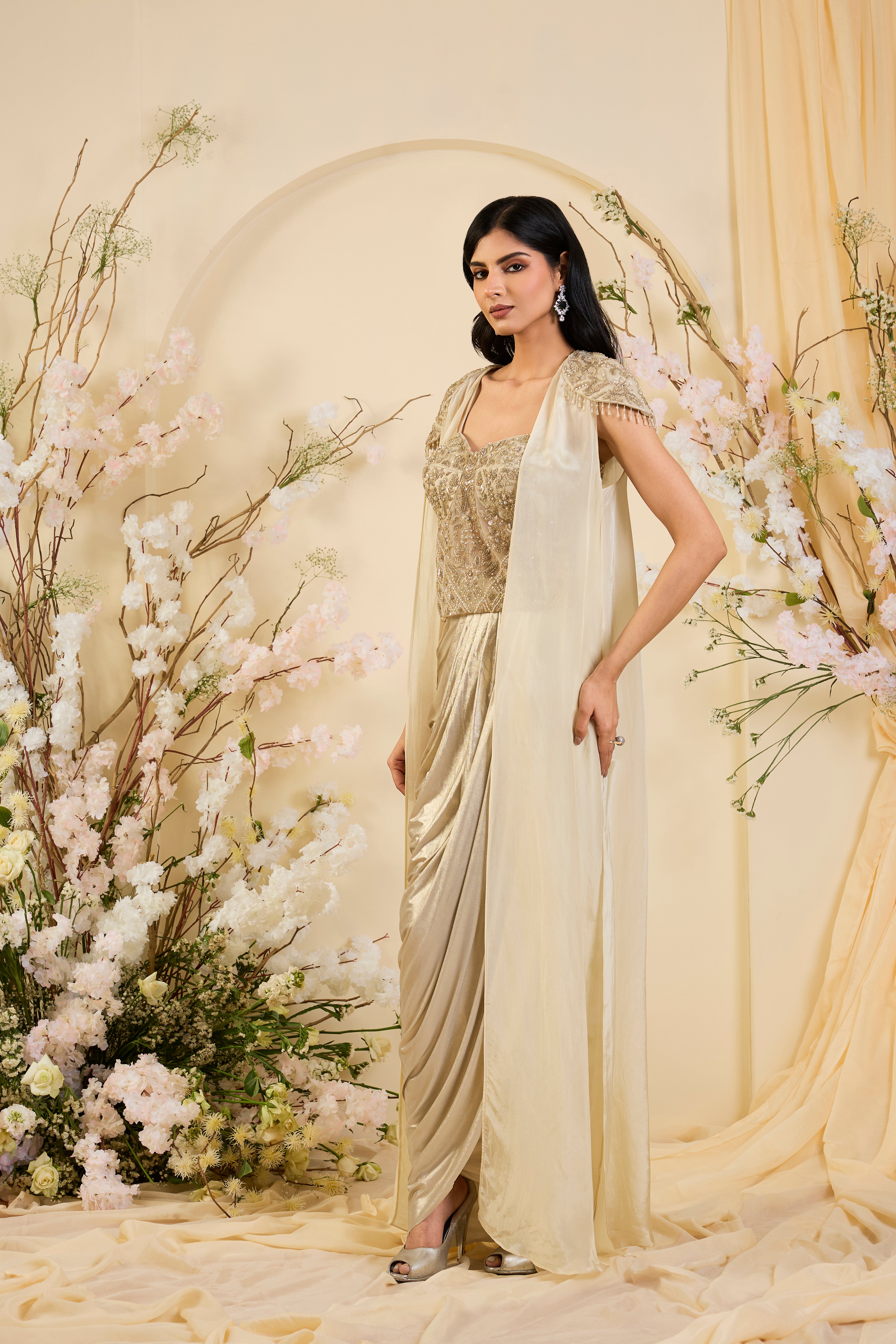Champagne Drape Saree Gown with Hand-Embellished Corset Bodice & Sheer Cape Elegance