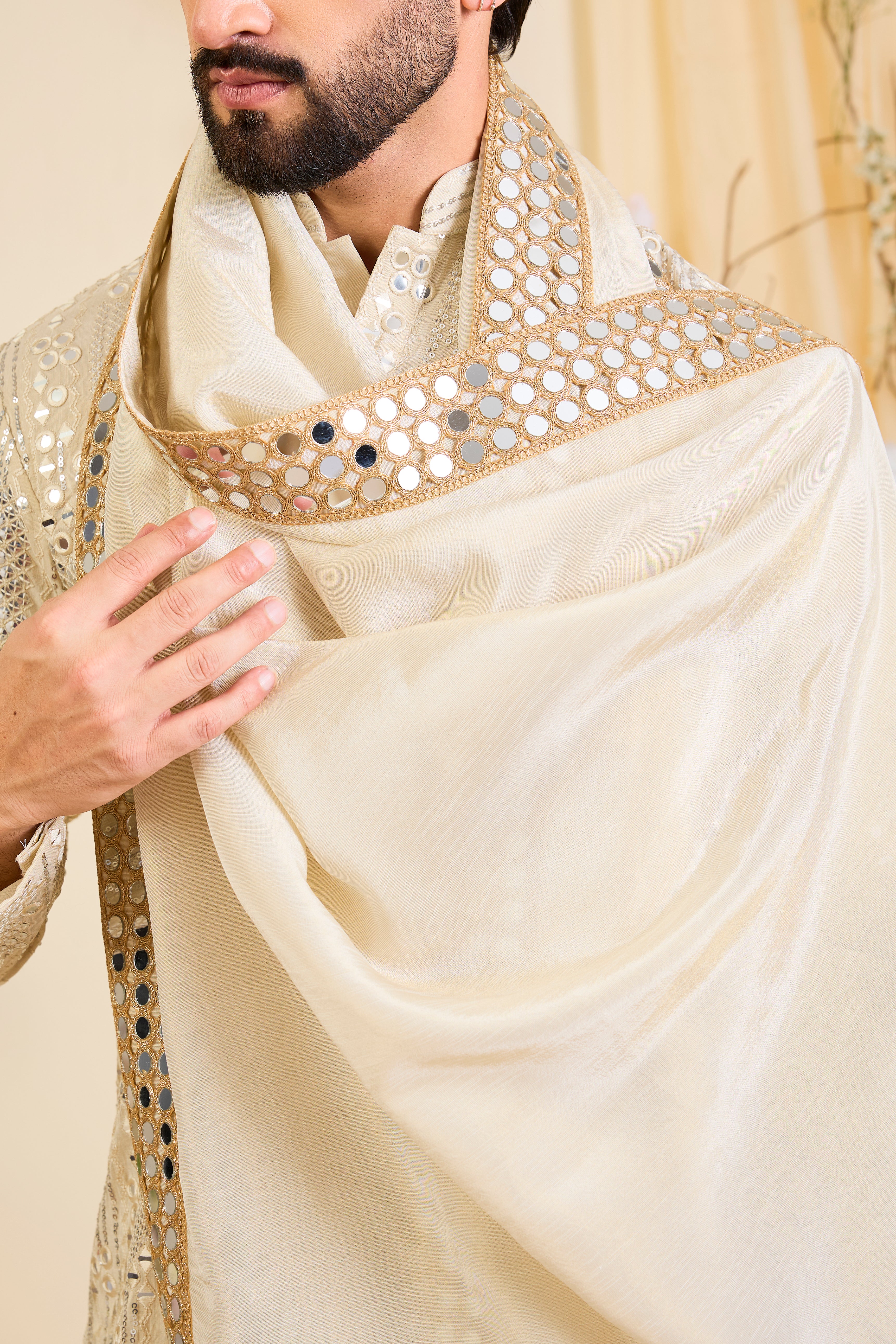 Golden tissue kurta with sequin mirrorwork, paired with a real mirror work stole and striking gold border — made to shine.