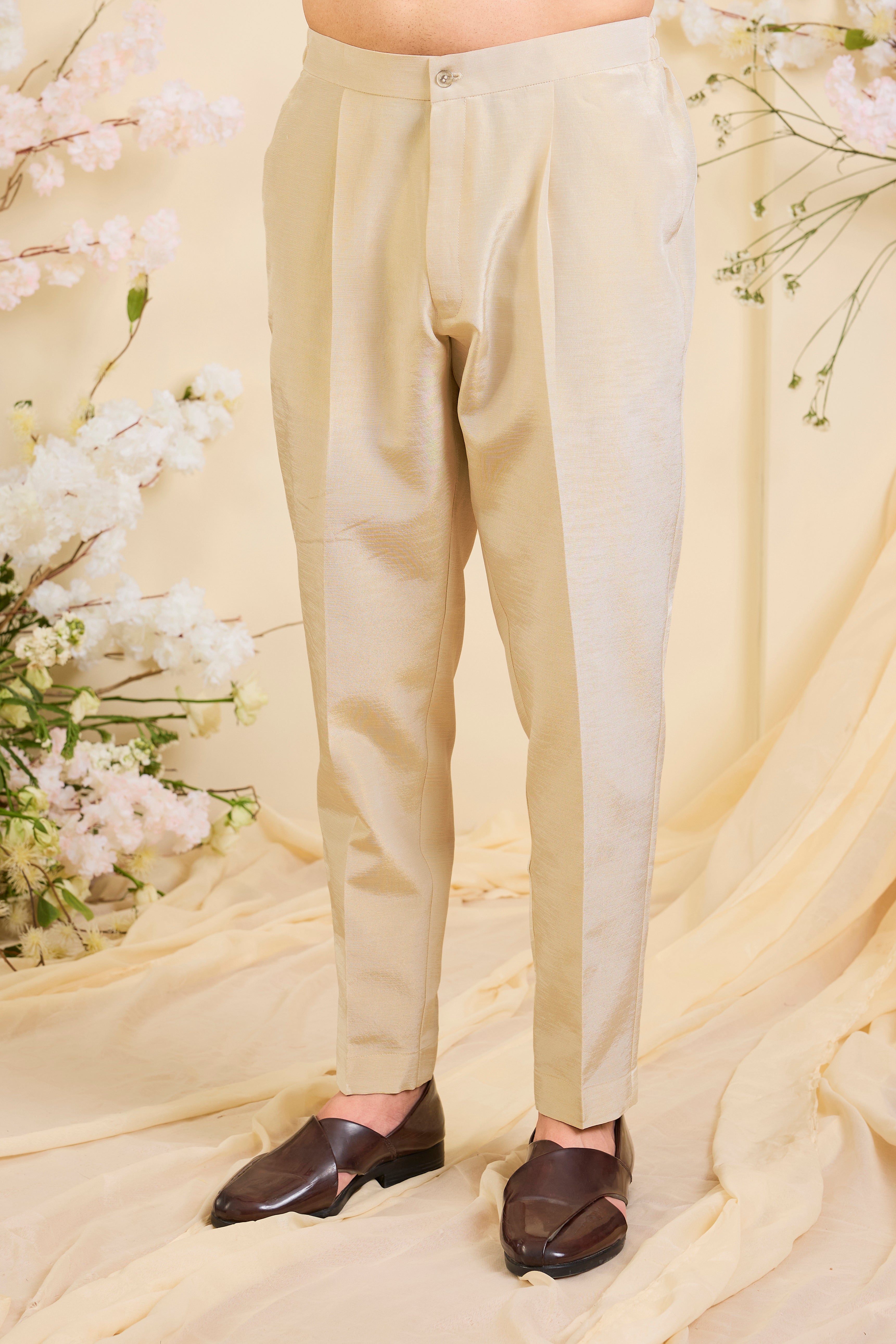 Golden tissue formal pant pyjamas with a structured, fused construction, offering a sharp silhouette and refined, polished elegance.