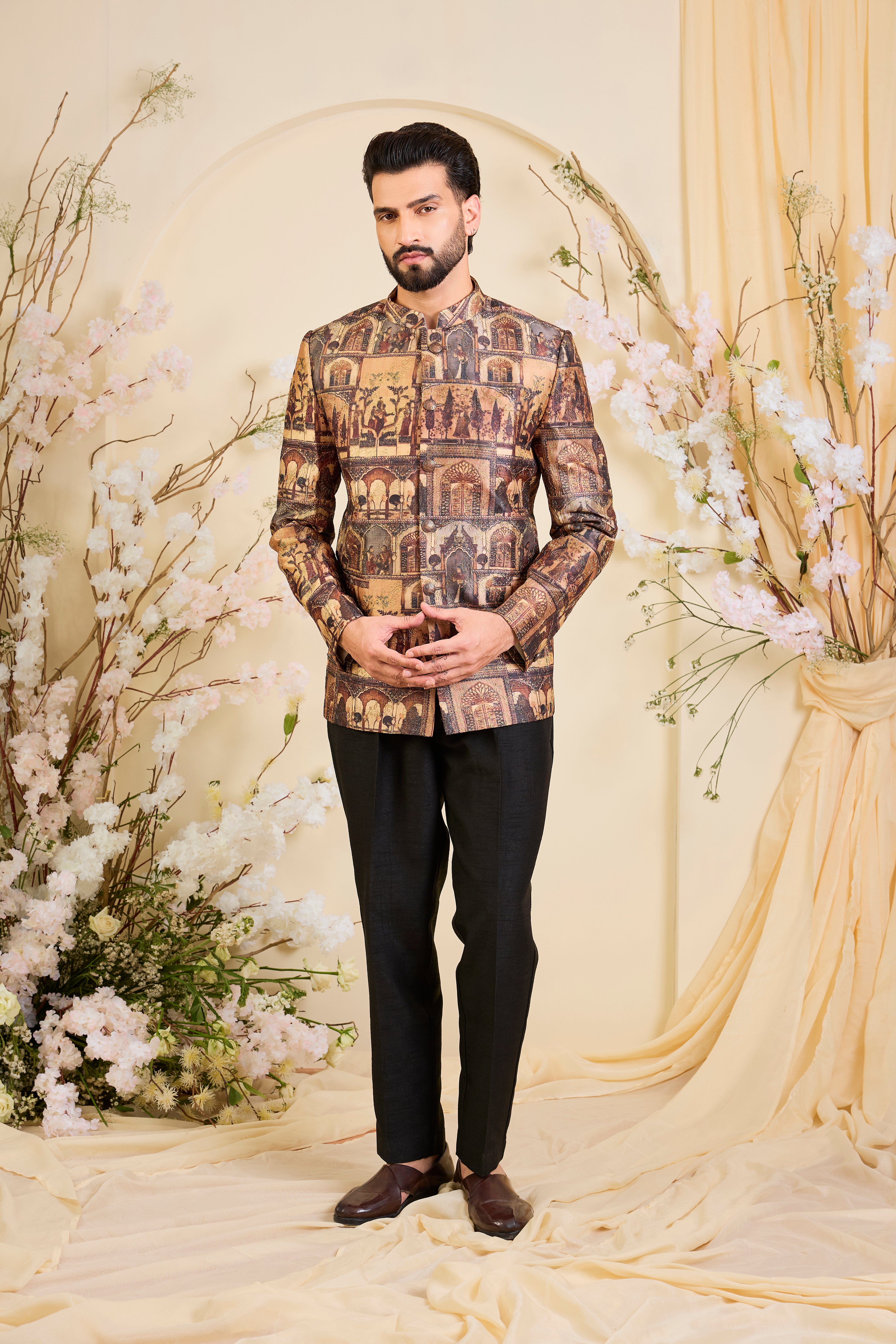 Rendered in a deep earthy brown, this bandgala unfolds like a living canvas of Mughal grandeur, adorned with intricately illustrated royal figures and courtly scenes.