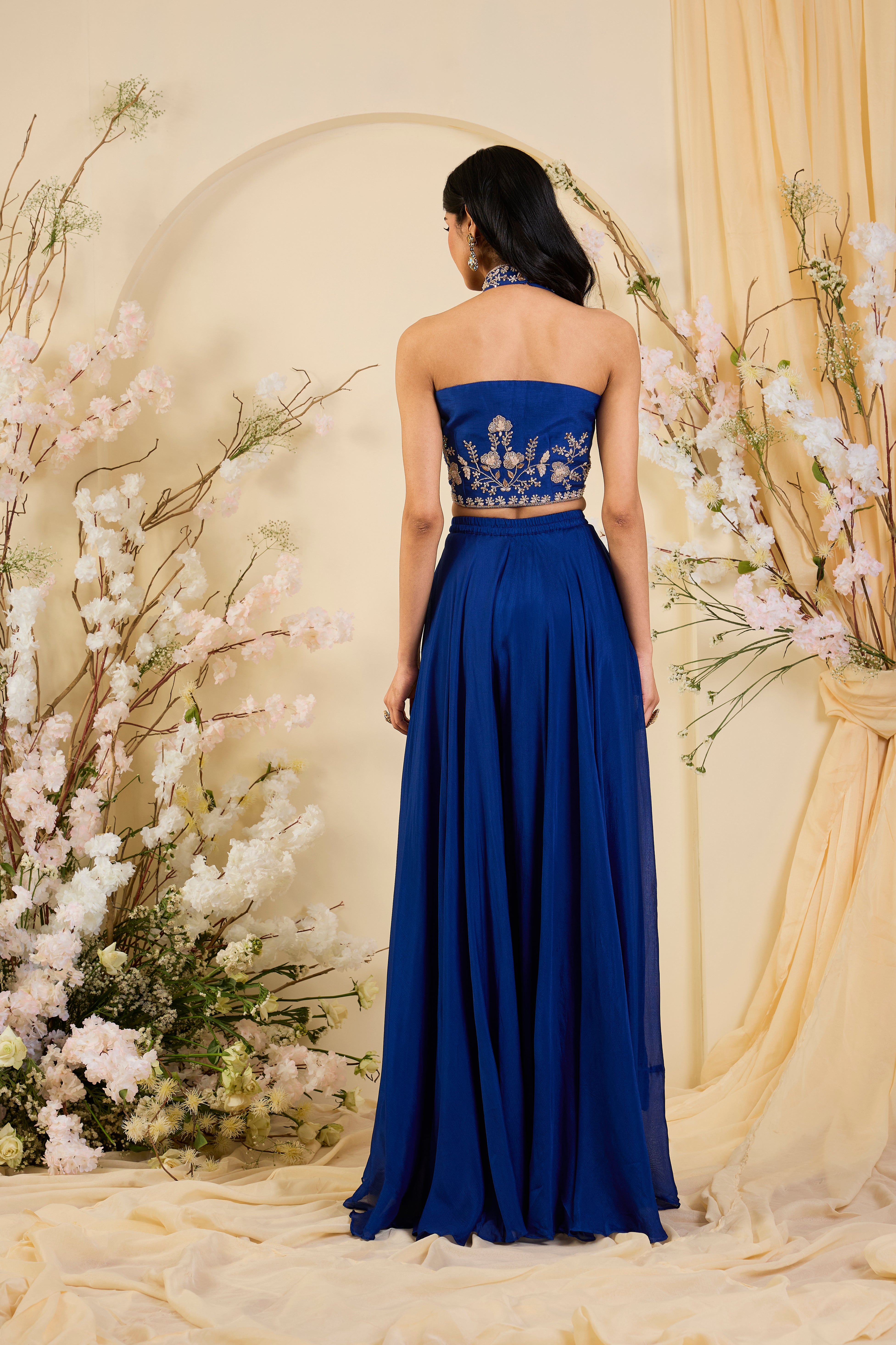 Cobalt Muse: Embroidered Halter Blouse with Fluid Palazzo Silhouette