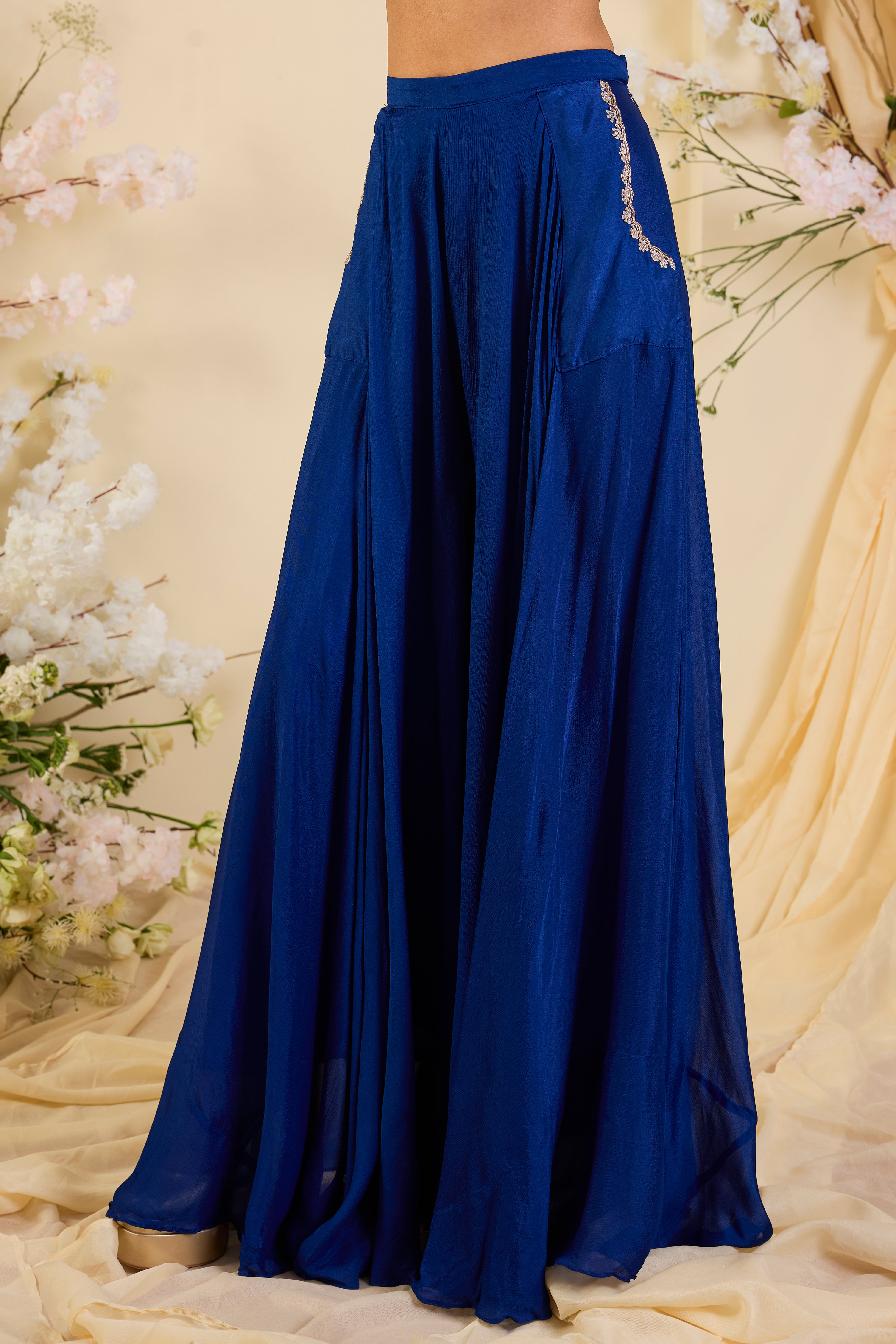 Cobalt Muse: Embroidered Halter Blouse with Fluid Palazzo Silhouette
