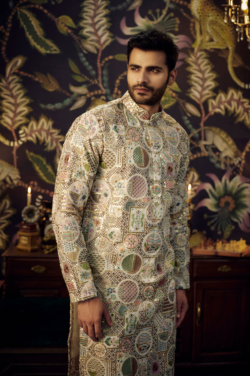 Off-white floral embroidered kurta with multi-threadwork