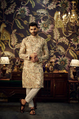 Cream chikankari kurta with intricate flora and fauna embroidery and multi-threadwork - kasbahmen