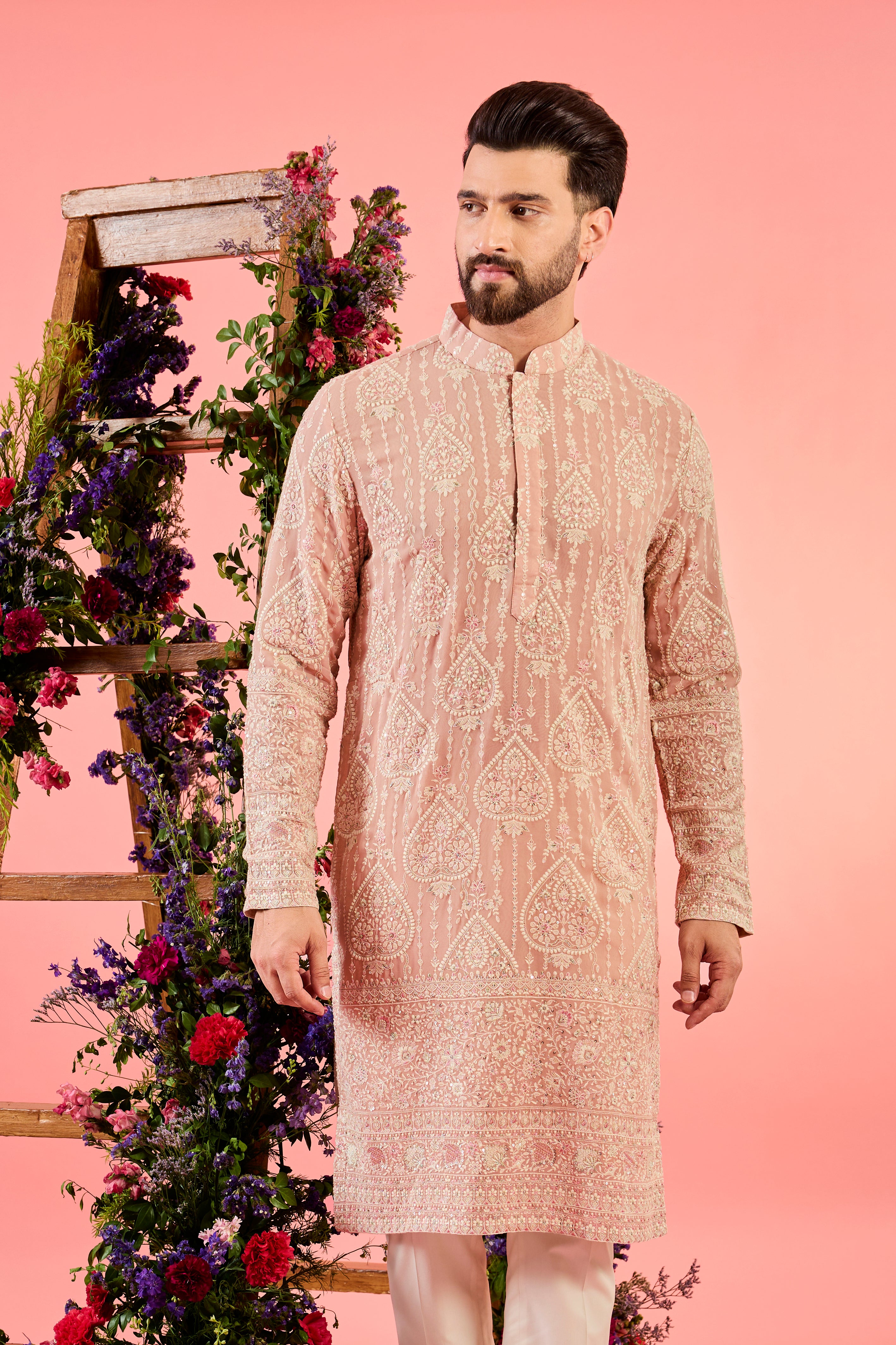 This pink chikankari kurta showcases exquisite  embroidery, blending tradition with elegance