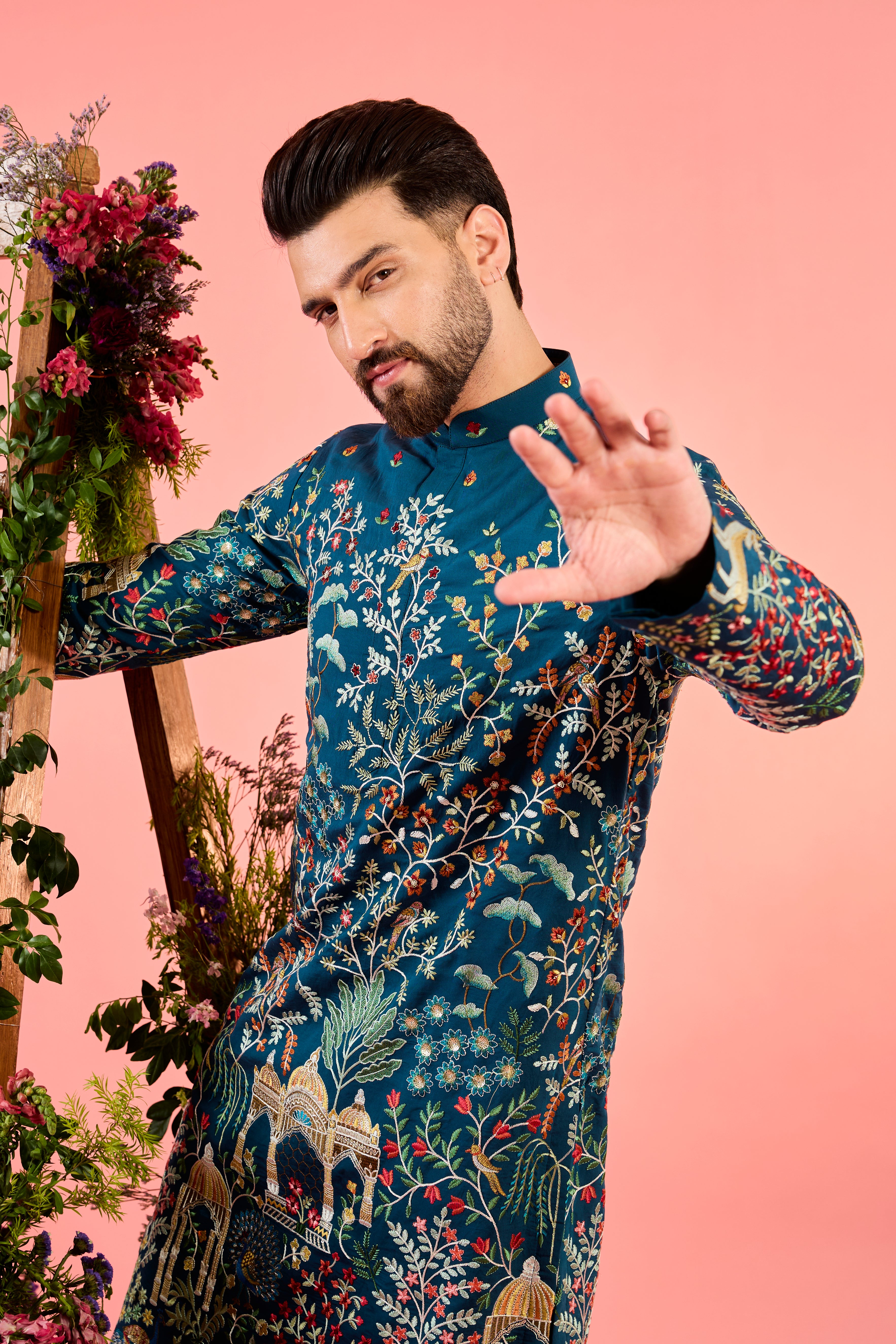 blue chikankari kurta with intricate flora and fauna embroidery