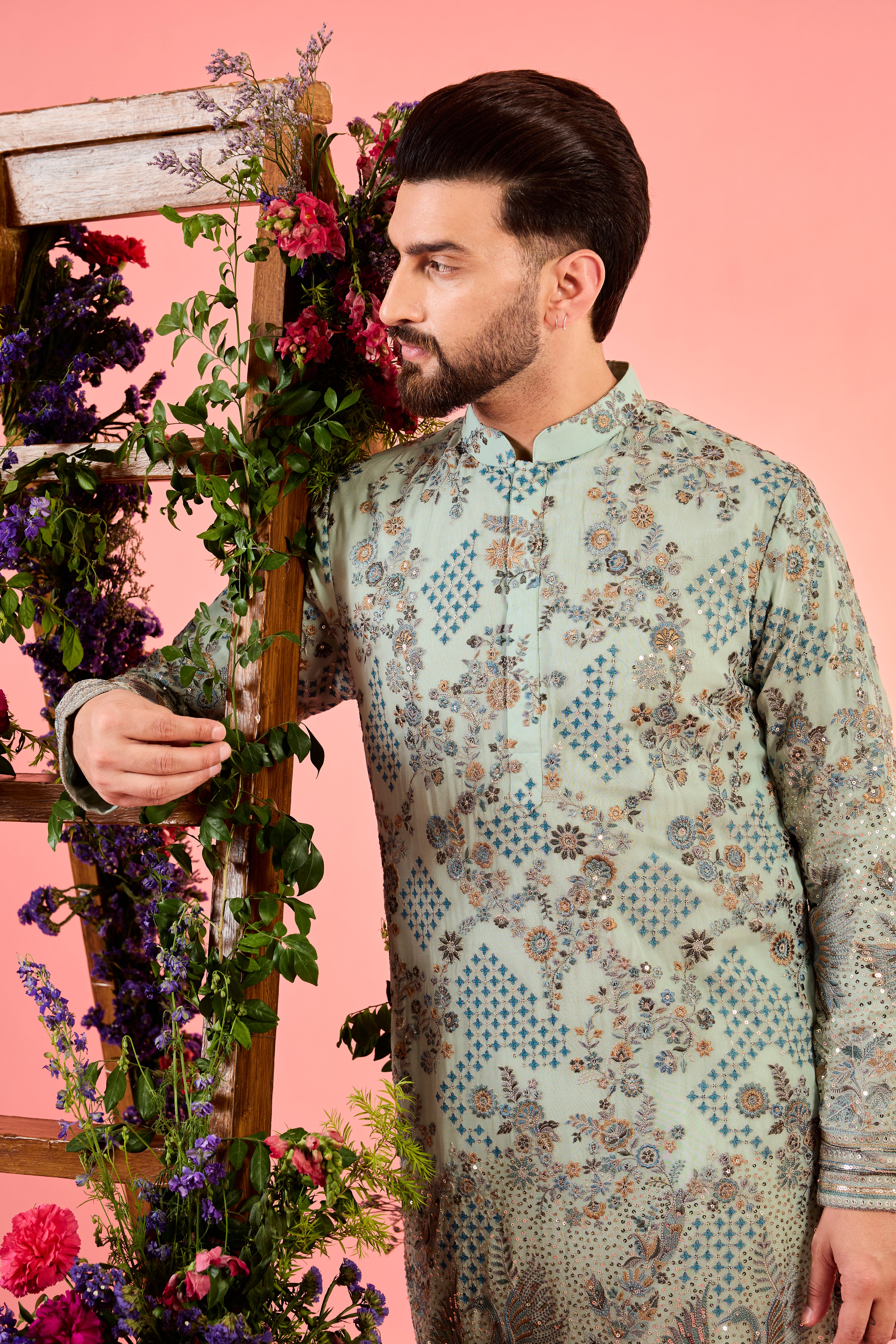 green chikankari kurta with intricate flora and fauna embroidery