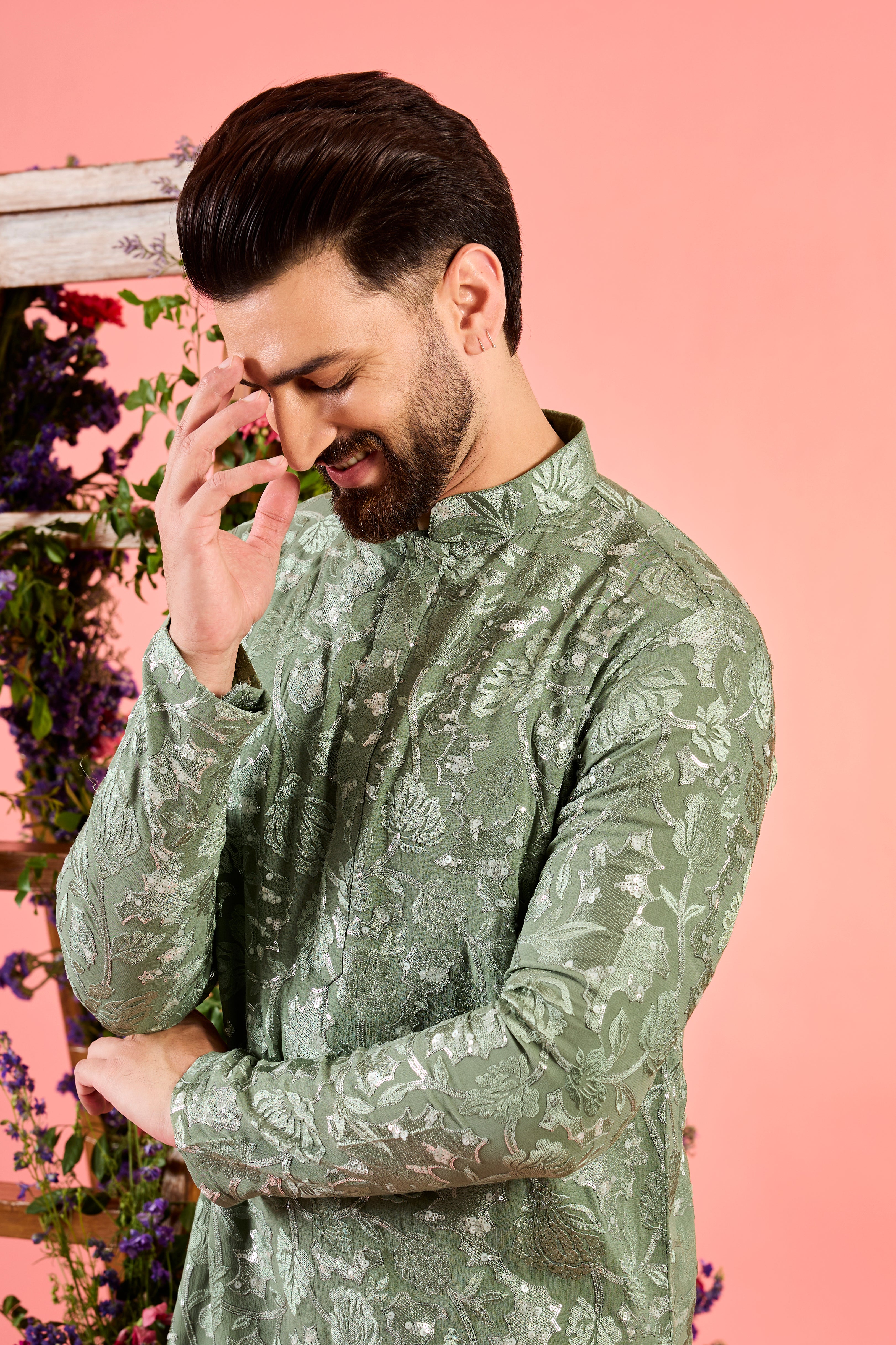 sage green chikankari kurta with intricate floral embroidery